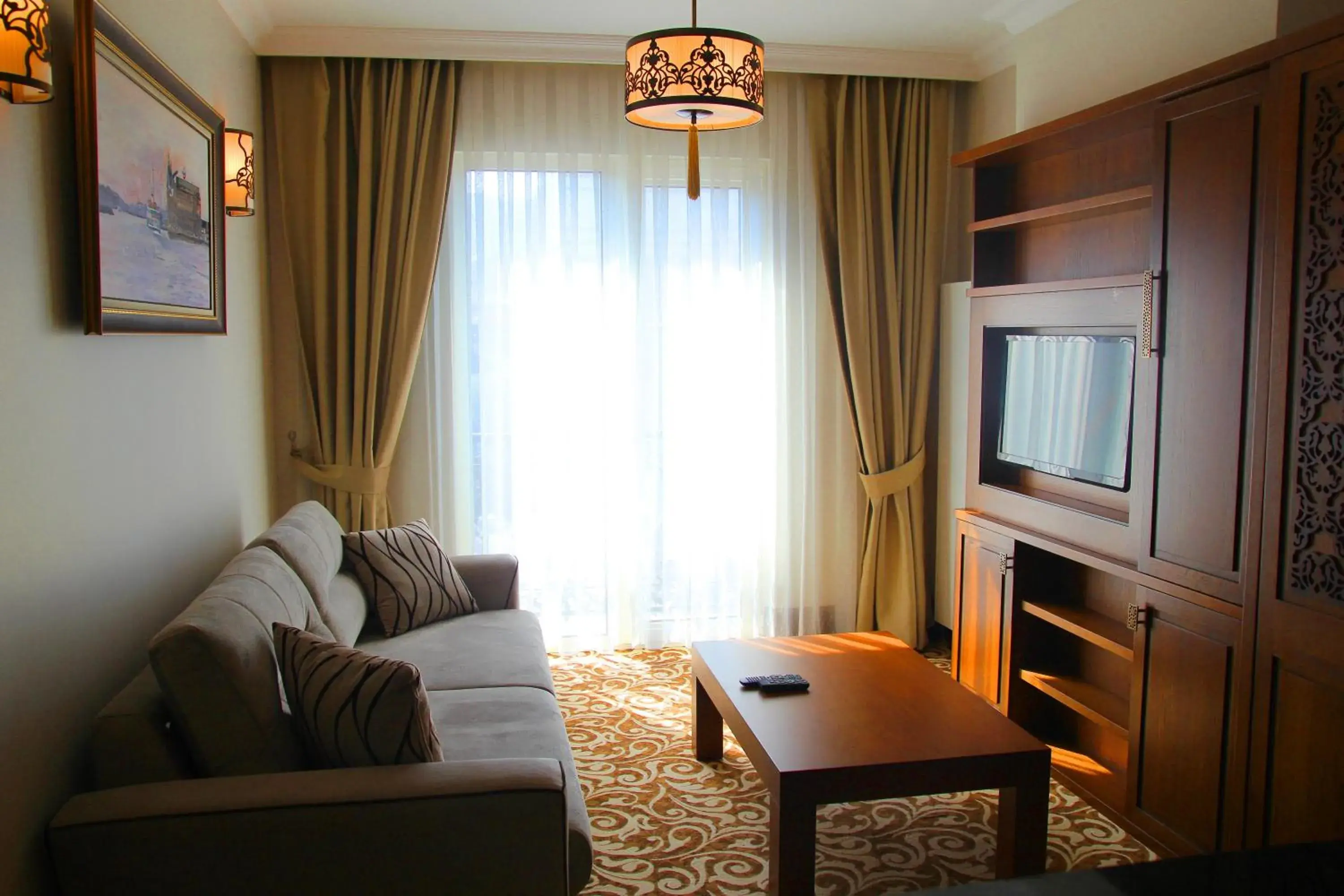 Living room, Seating Area in K Suites Hotel