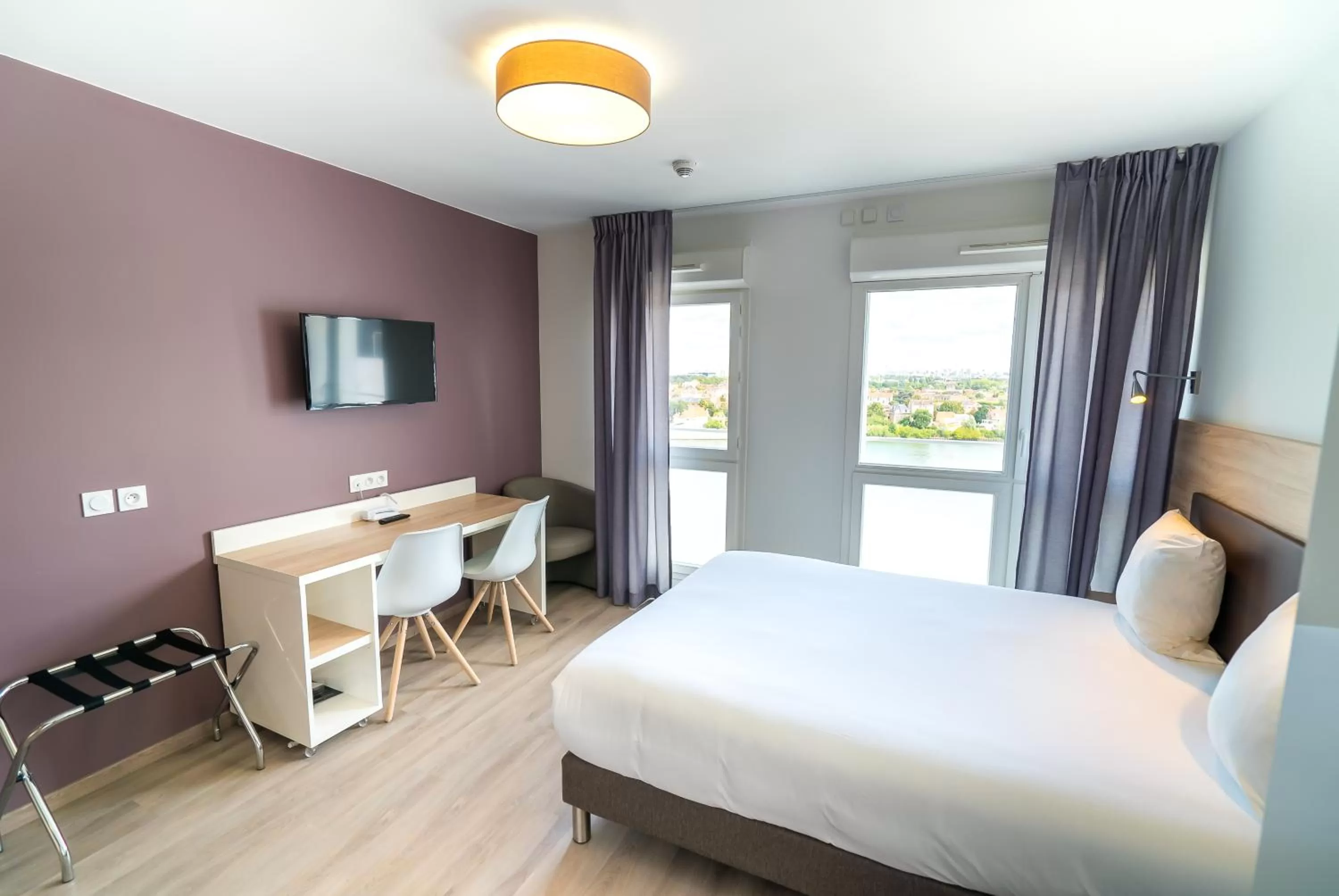 Photo of the whole room, Bed in All Suites Appart Hôtel - Choisy-le-Roi