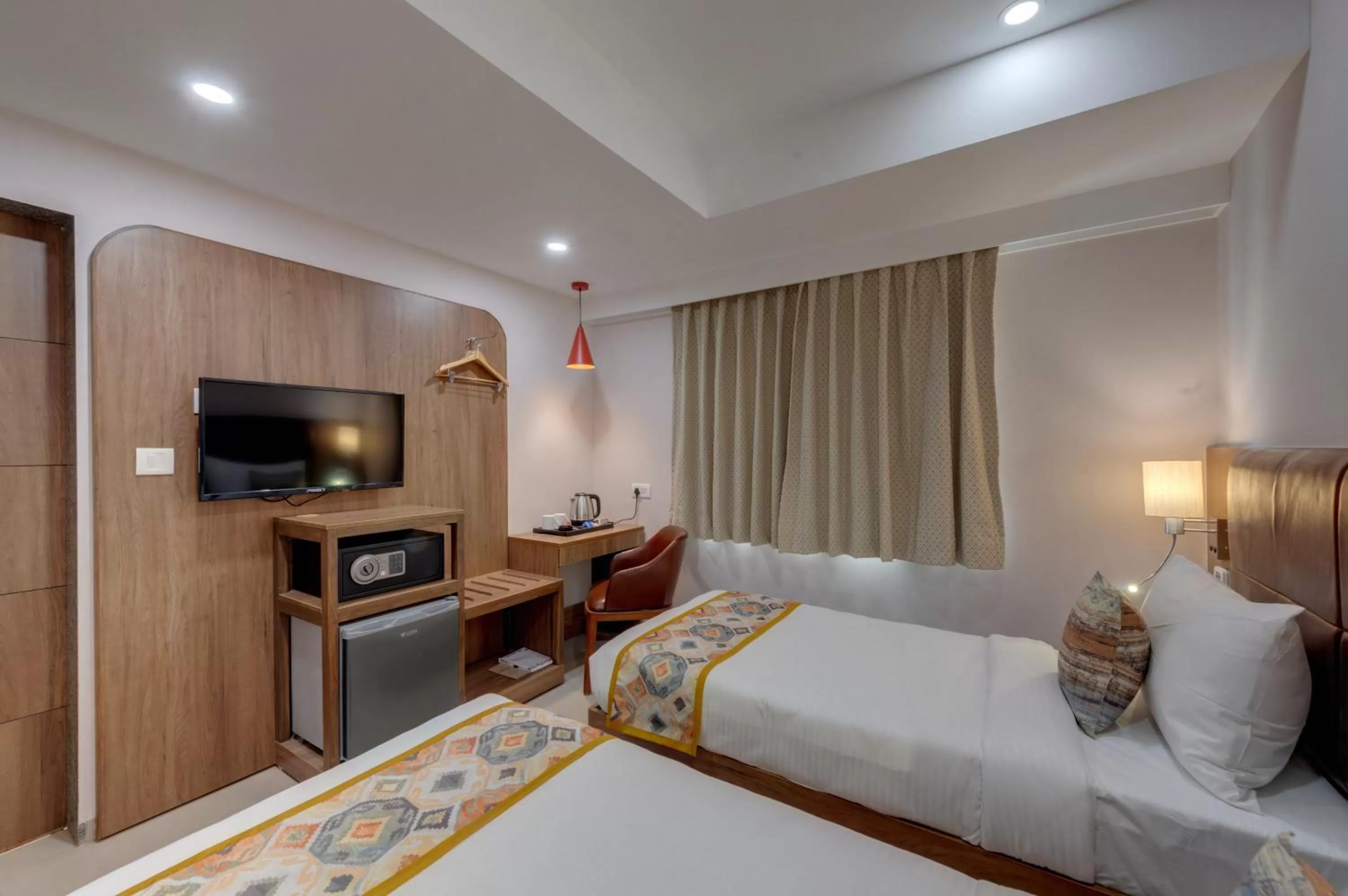 Photo of the whole room, Bed in The Beacon Hotel Vadodara