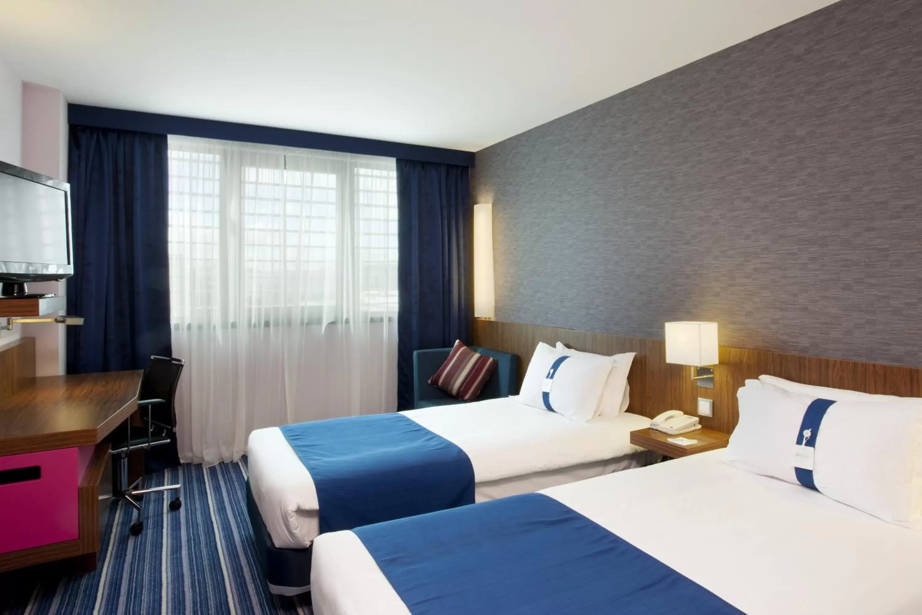 Photo of the whole room, Bed in Holiday Inn Express Lisbon Airport, an IHG Hotel