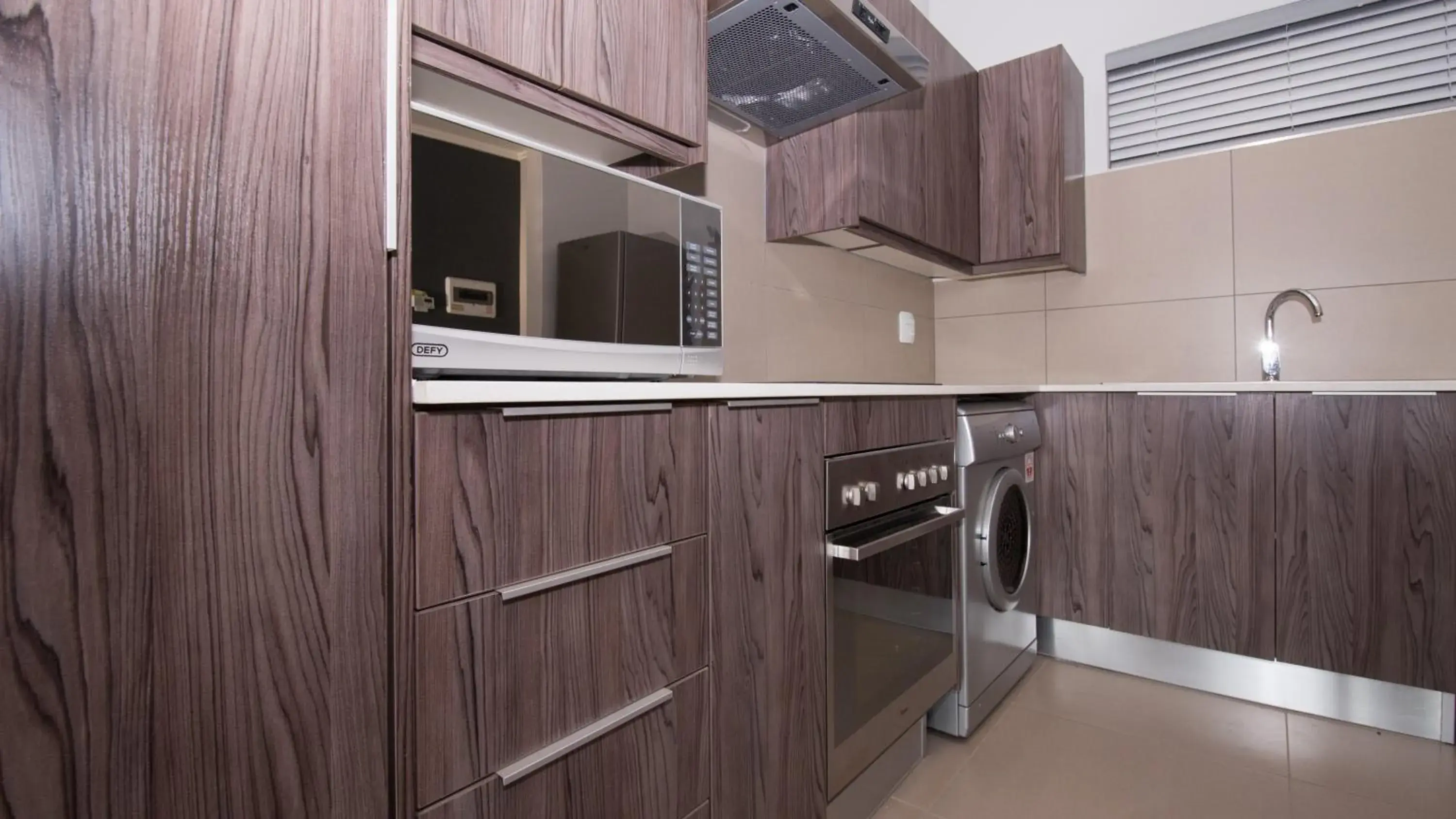 Kitchen or kitchenette, Kitchen/Kitchenette in Odyssey Luxury Apartments