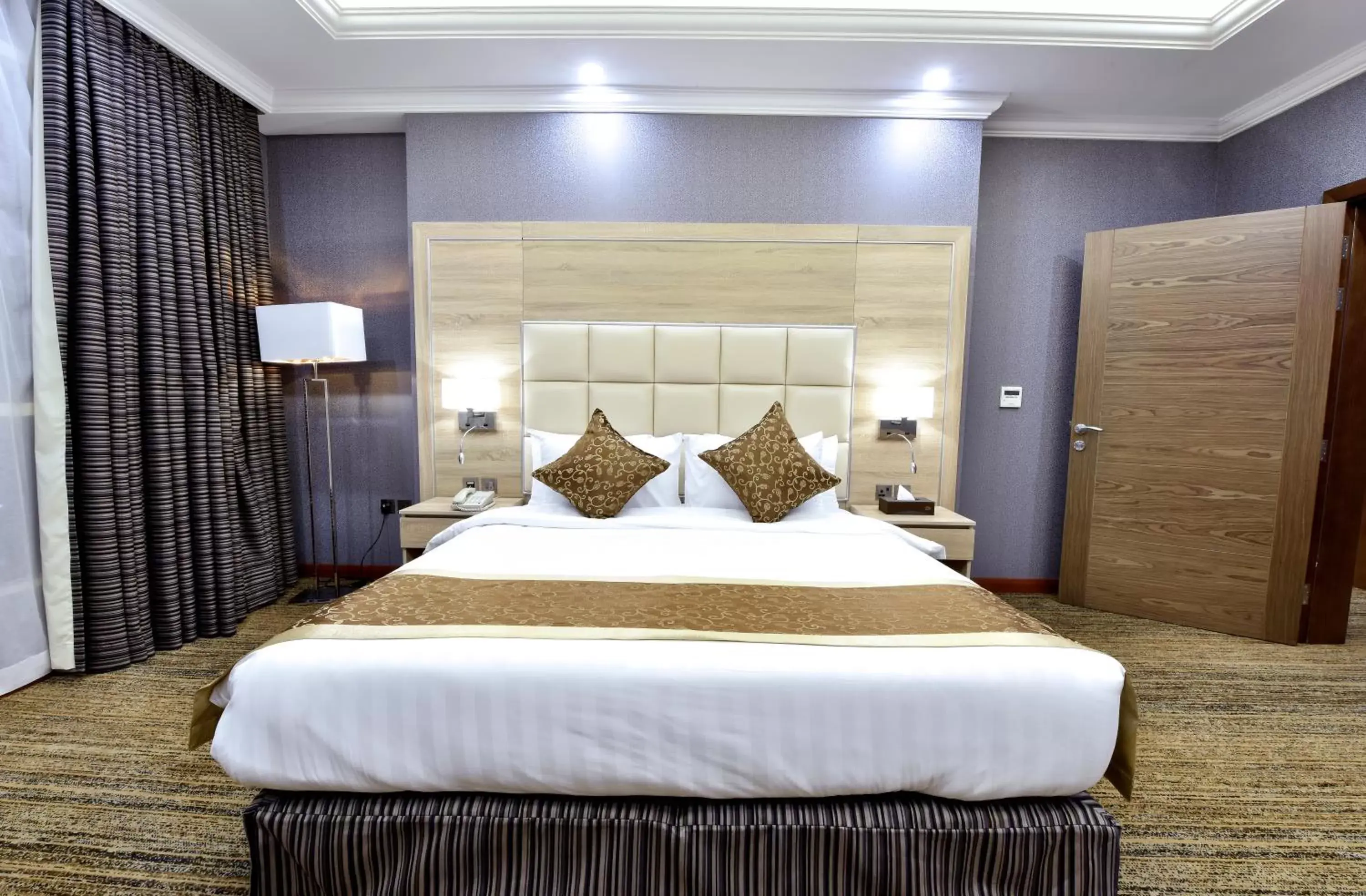 Bed in Iridium 70 Hotel