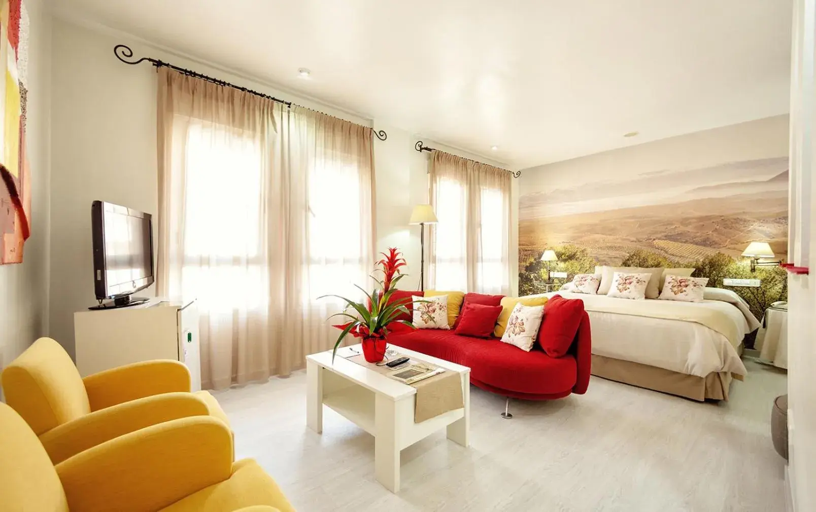 Bed, Seating Area in Hotel Torrepalma