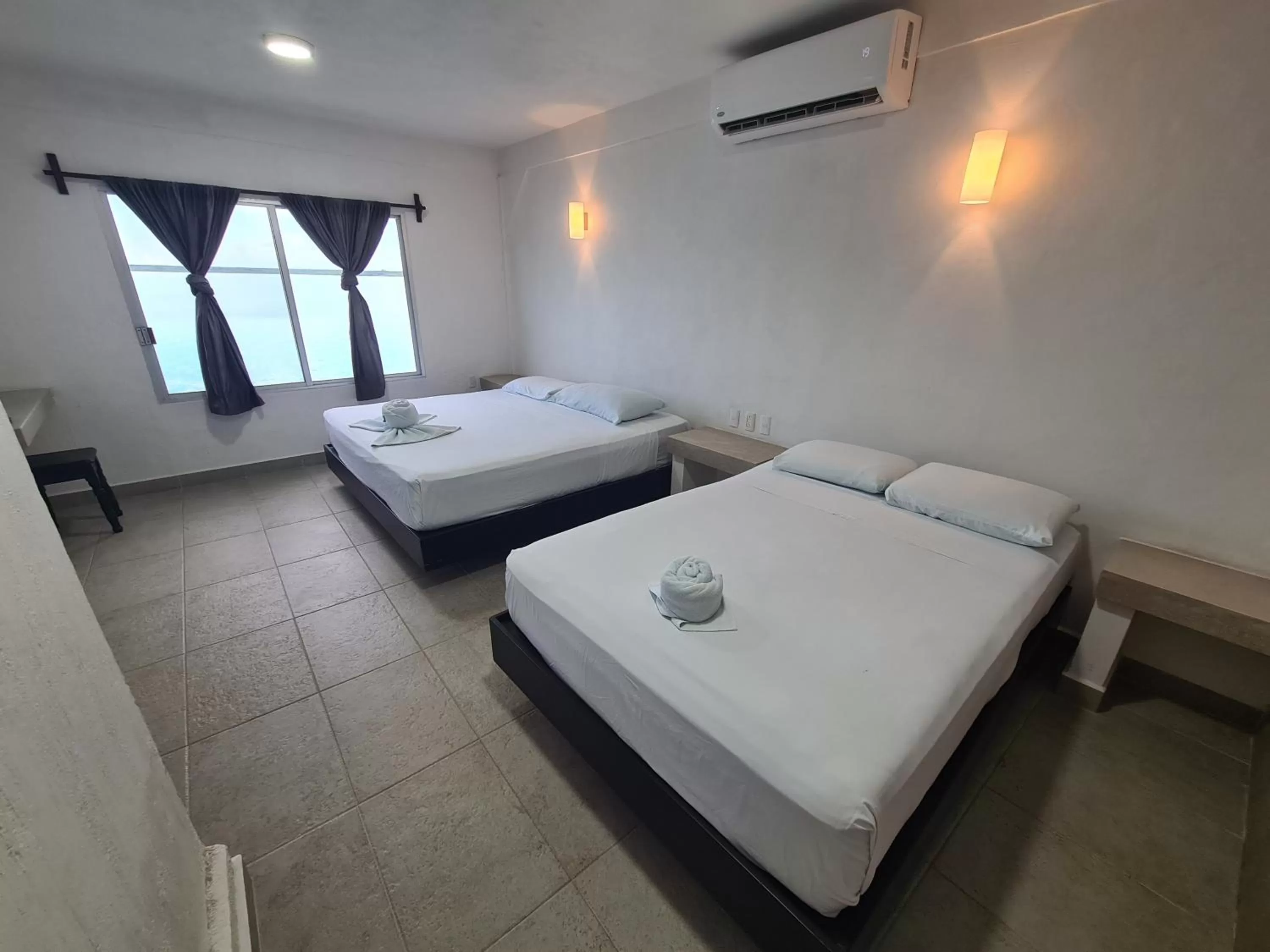 Photo of the whole room, Bed in Hotel Vista Laguna Bacalar