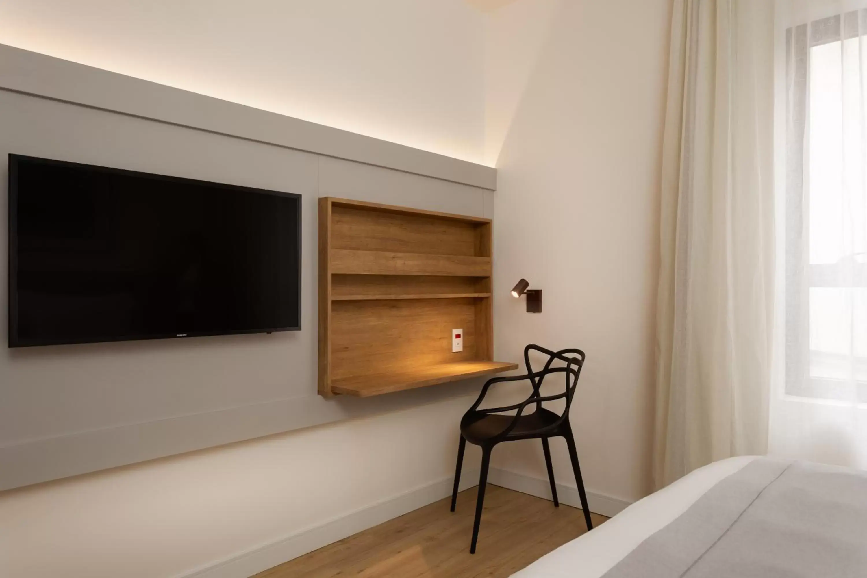 Bed, TV/Entertainment Center in TRYP by Wyndham Sao Paulo Paulista Paraiso