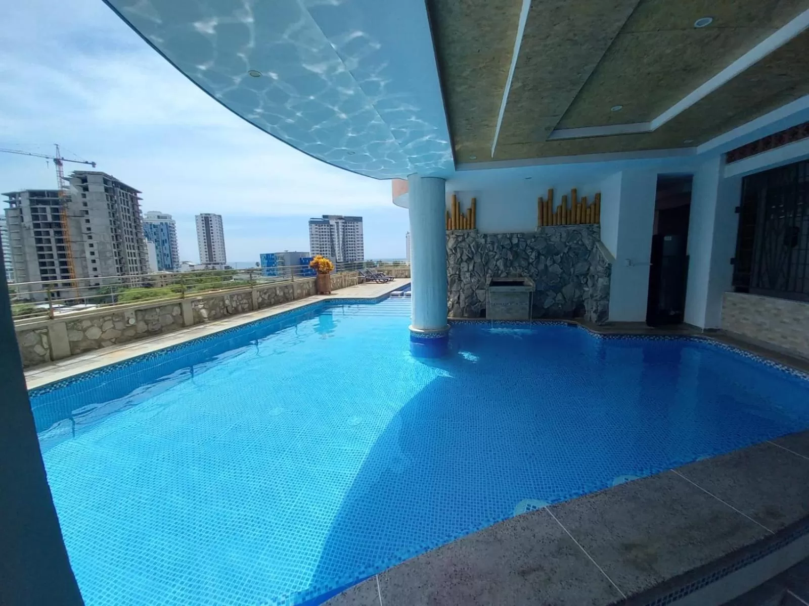 Swimming pool in Terrazas Tayrona Travelers Apartamentos y Suites