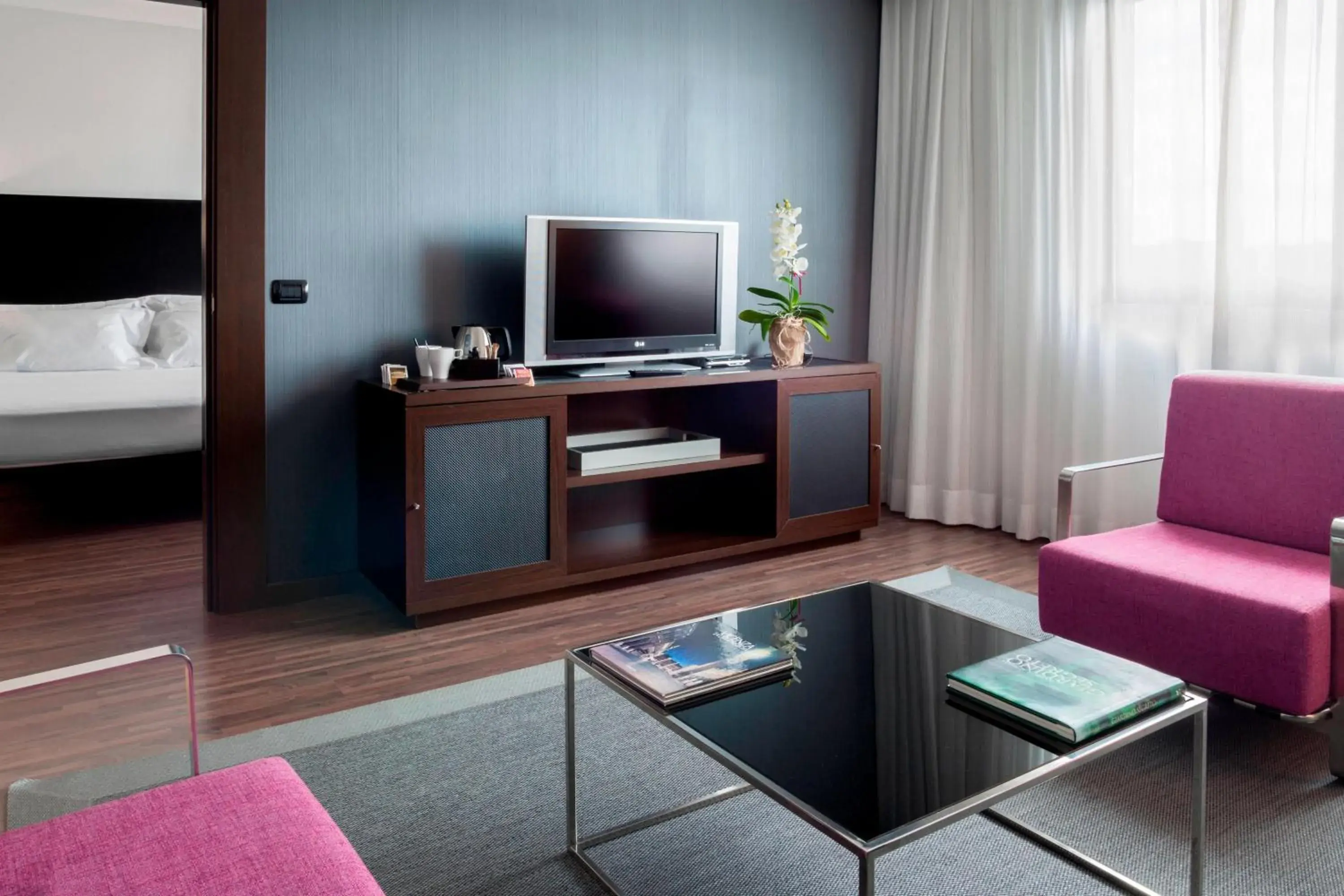Living room, TV/Entertainment Center in AC Hotel Vicenza by Marriott