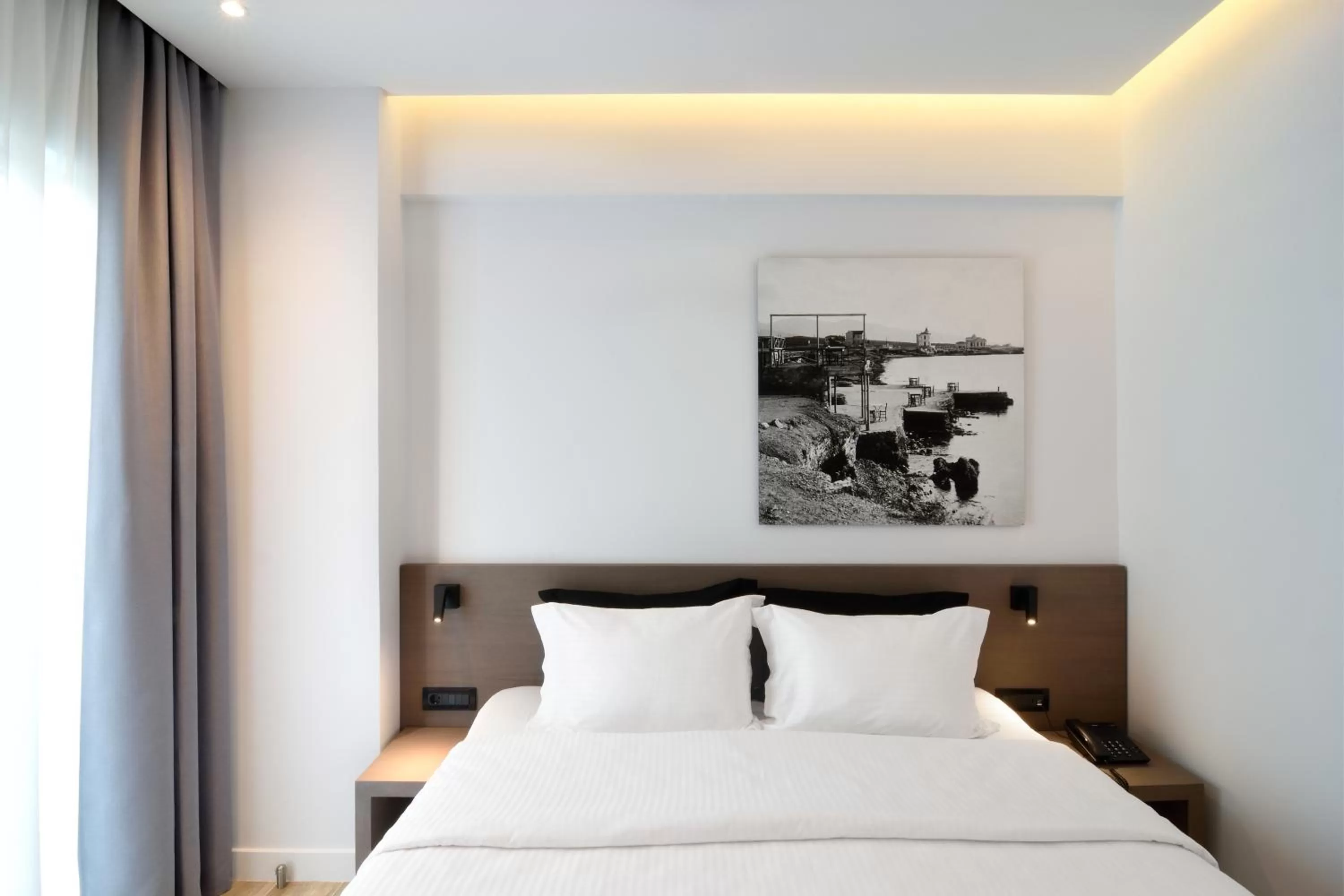 Bed in Poseidon Athens Hotel