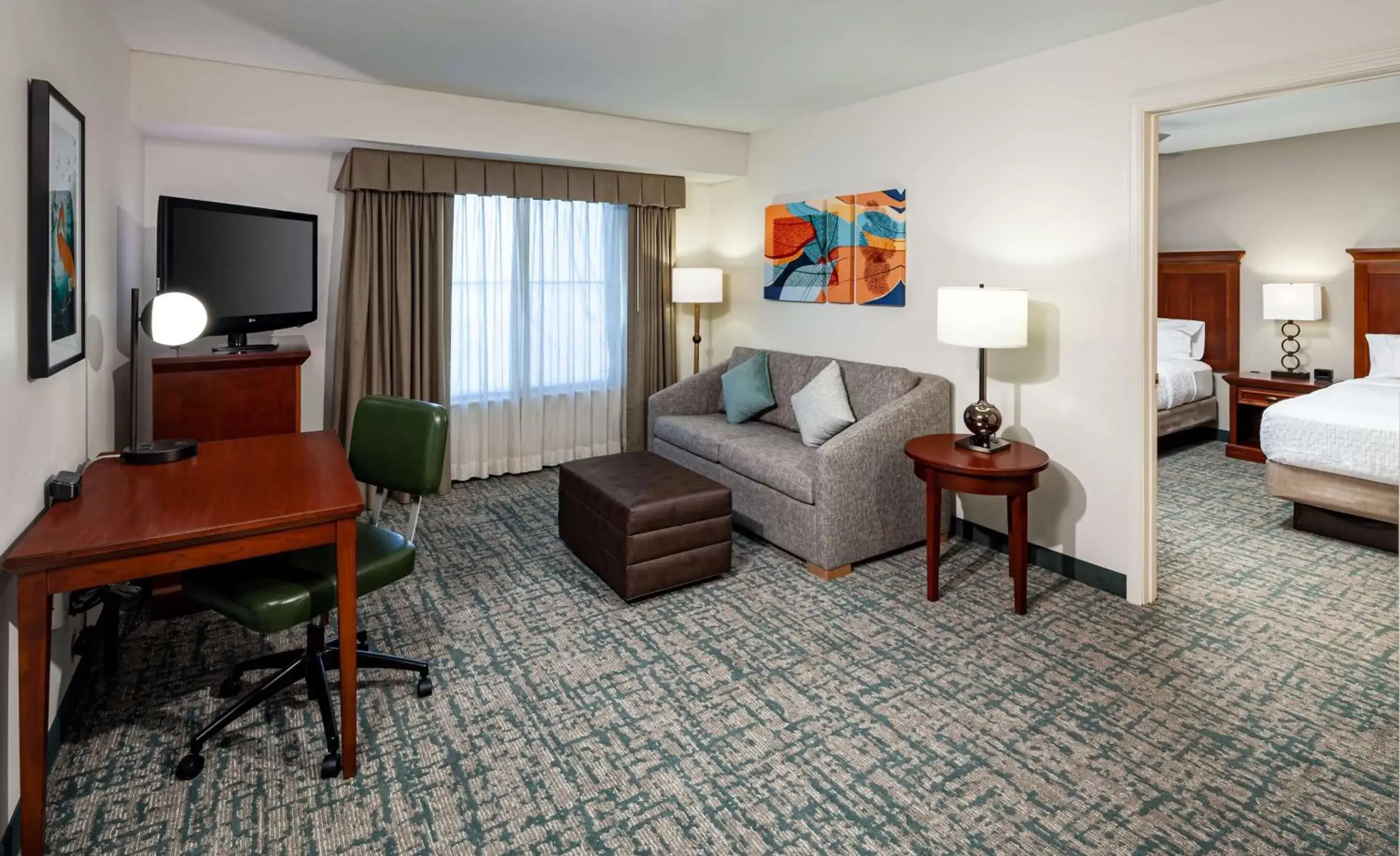 Bedroom, Seating Area in Homewood Suites by Hilton Gainesville