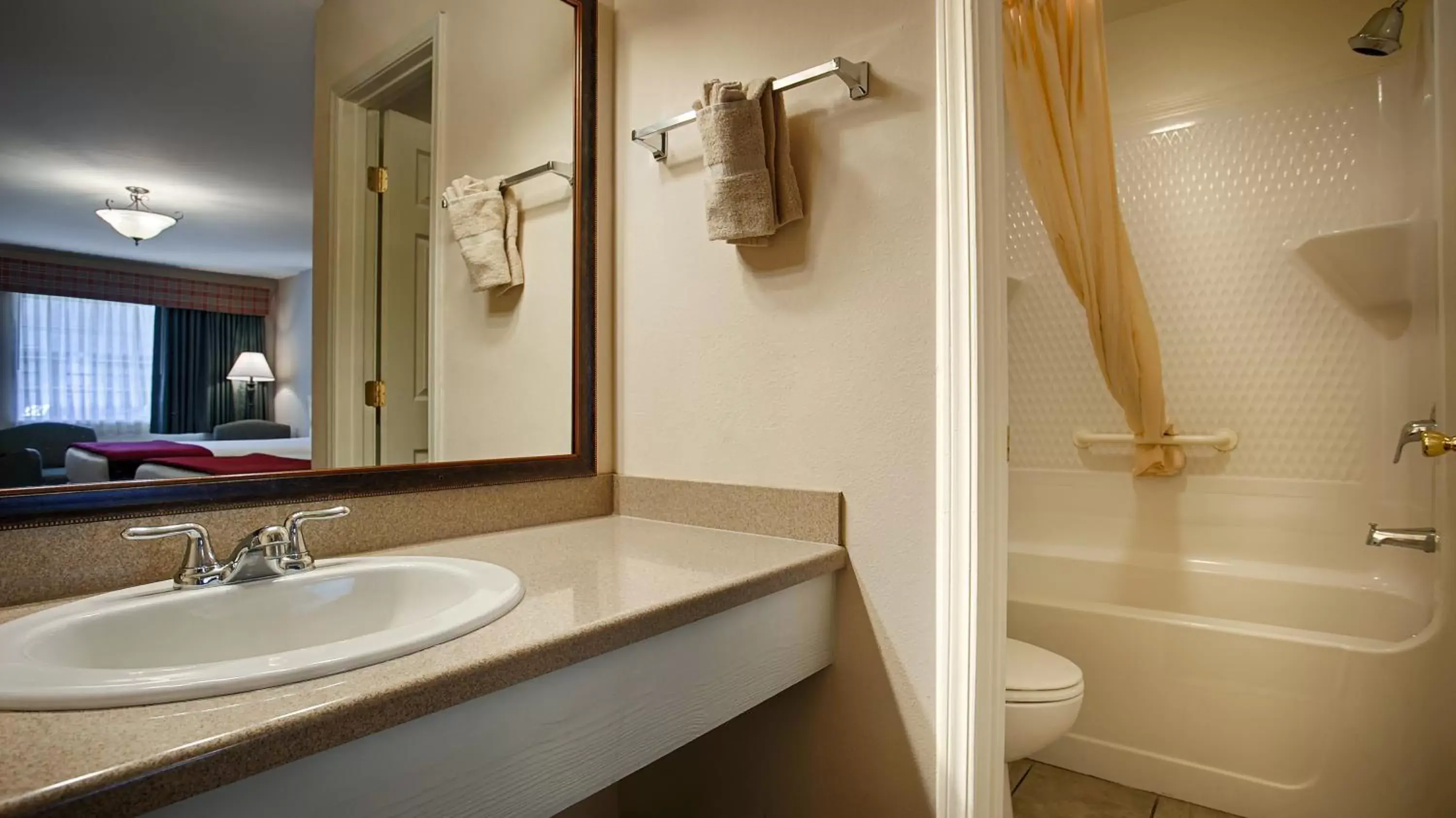 Bathroom in SureStay Hotel by Best Western Leesville