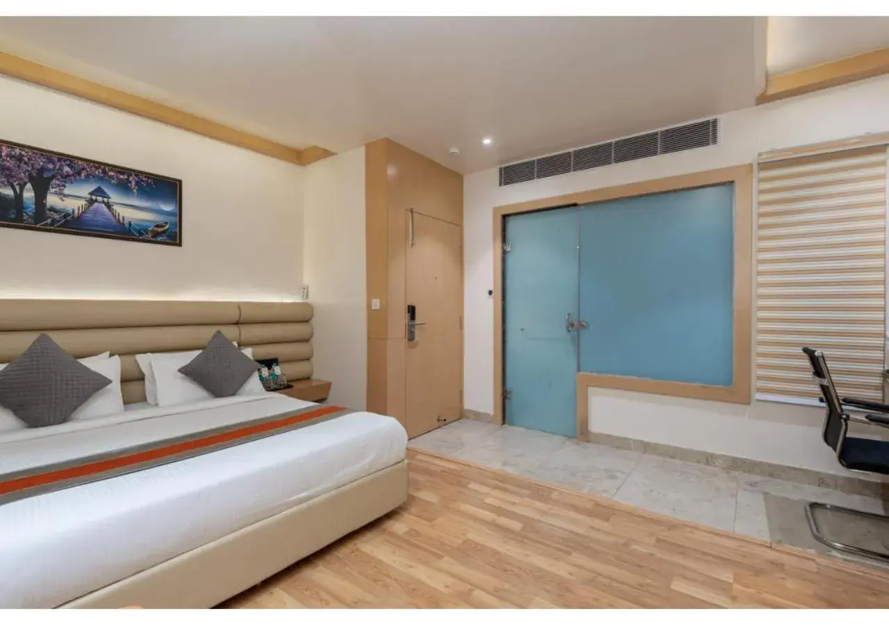 Bedroom, Bed in Hotel Arihant By DLS Hotels Bedroom, Bed in Hotel Arihant By DLS Hotels