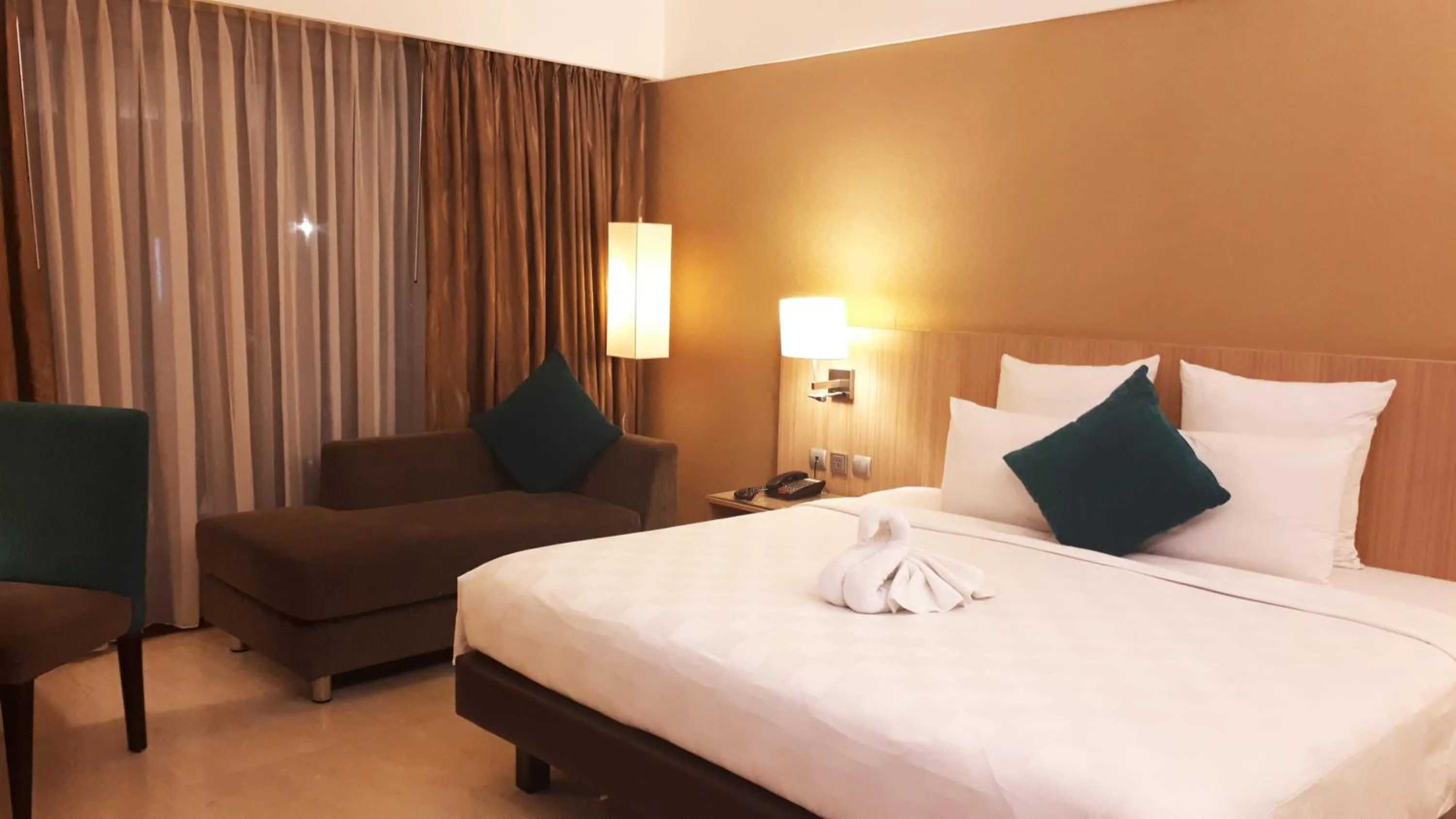 Bed in Novotel Surabaya Hotel