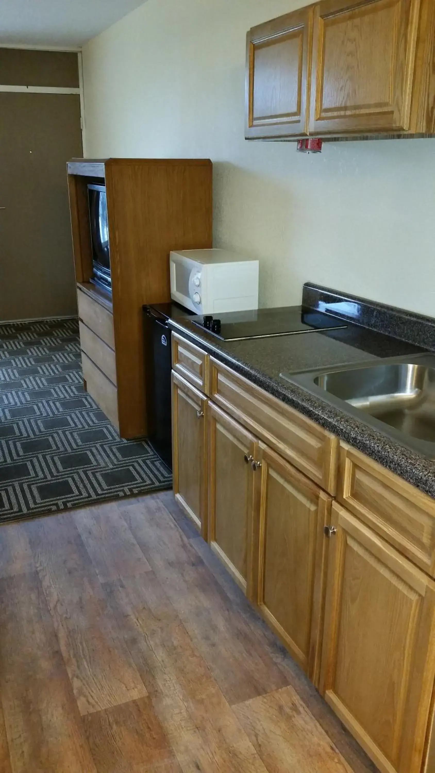 Kitchen or kitchenette, Kitchen/Kitchenette in Americourt Extended Stays