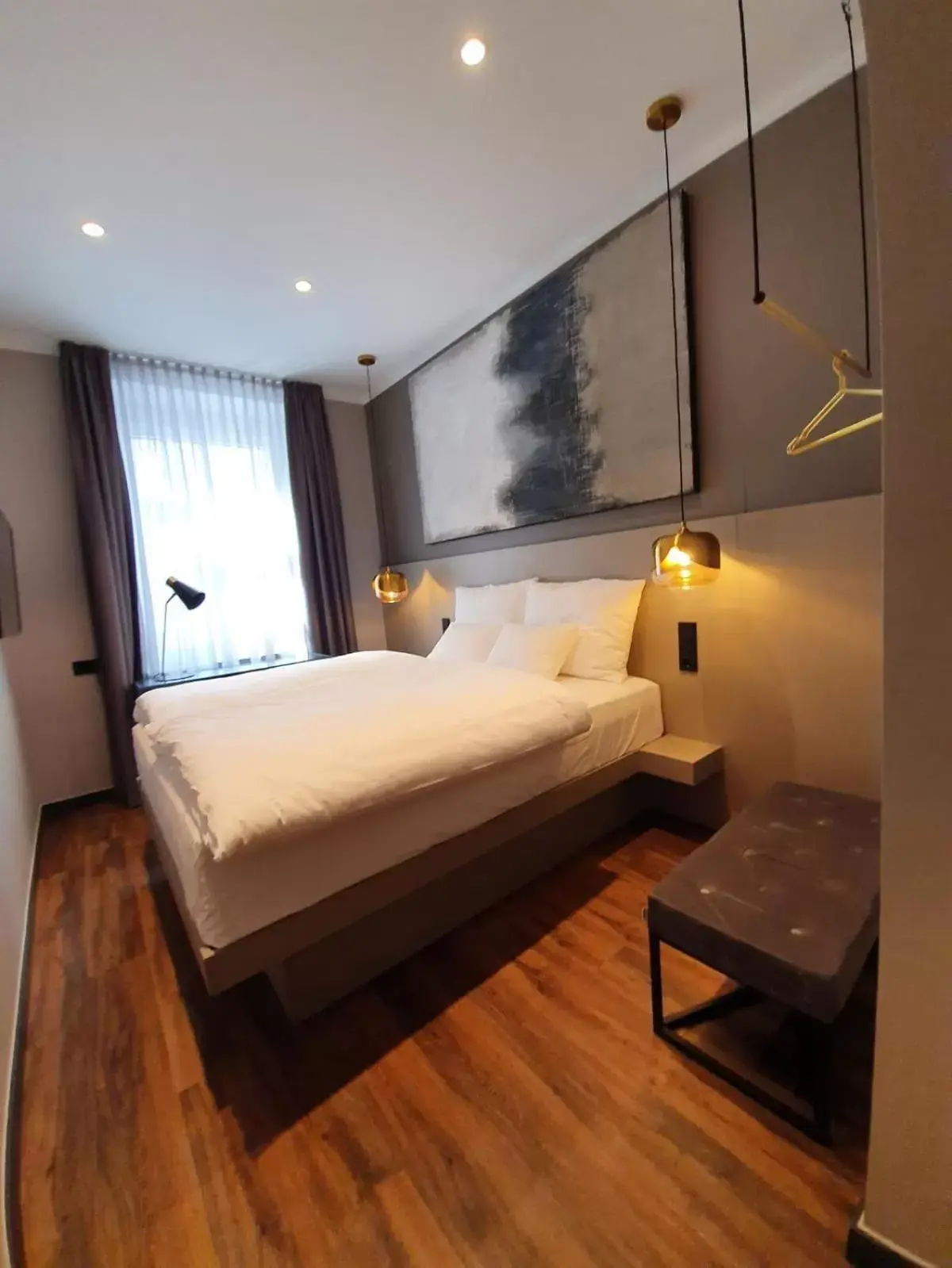 Bed in Munich Rooms Hotel