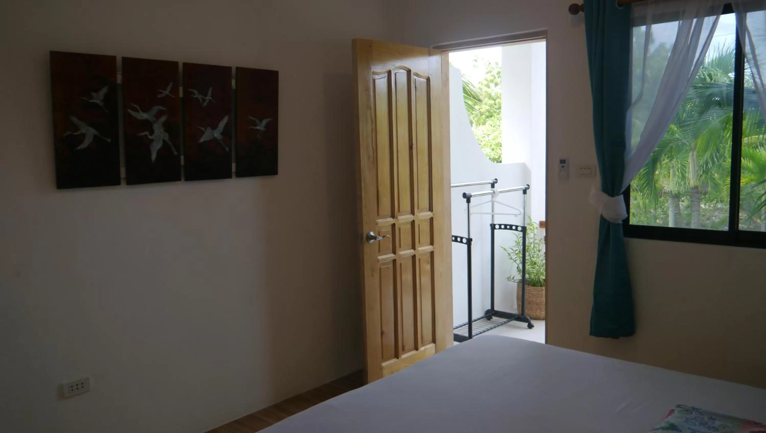 Living room, Bed in Moalboal T Breeze Coastal Resort