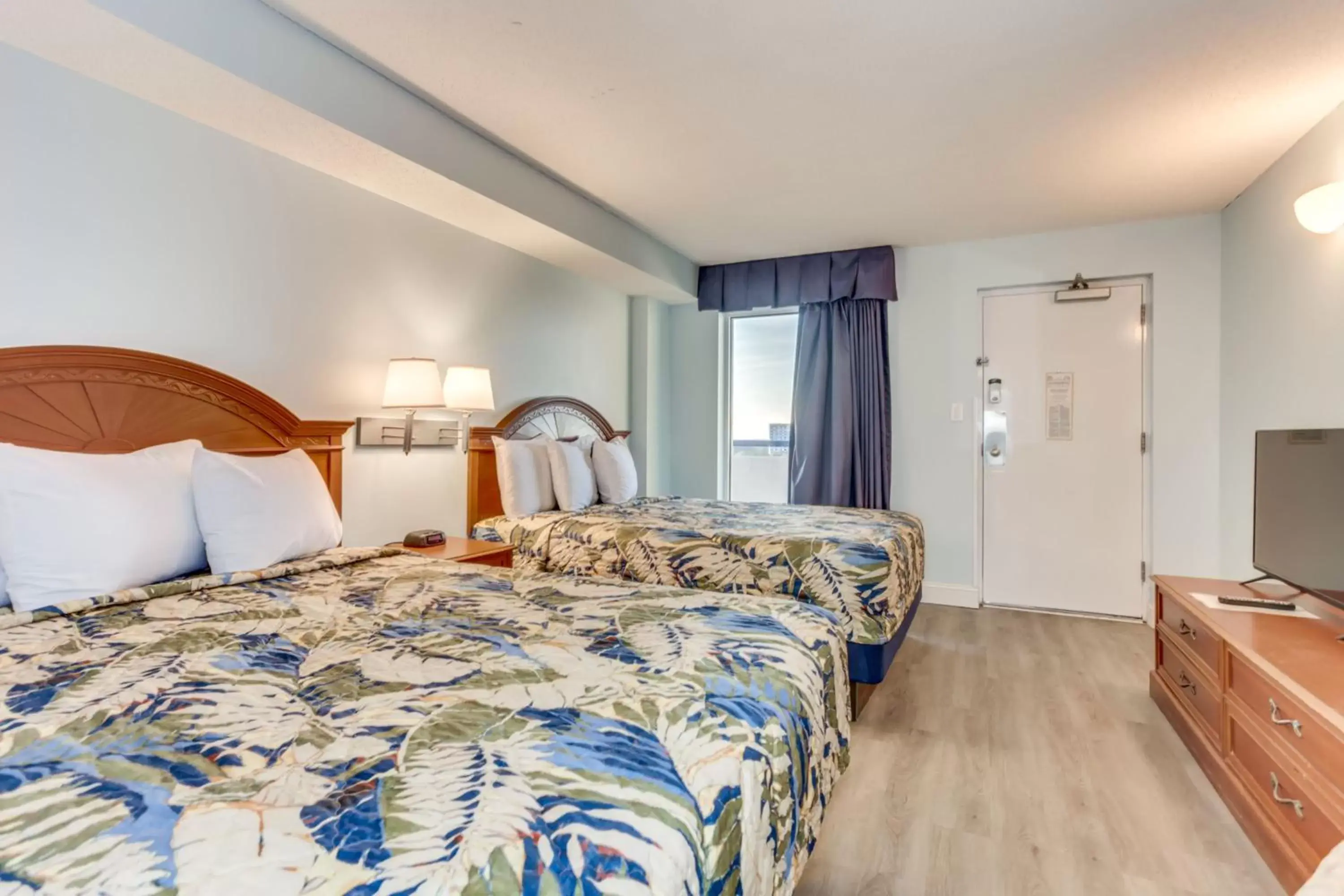 Bed in Boardwalk Beach Resort Condo w Oceanfront Balcony