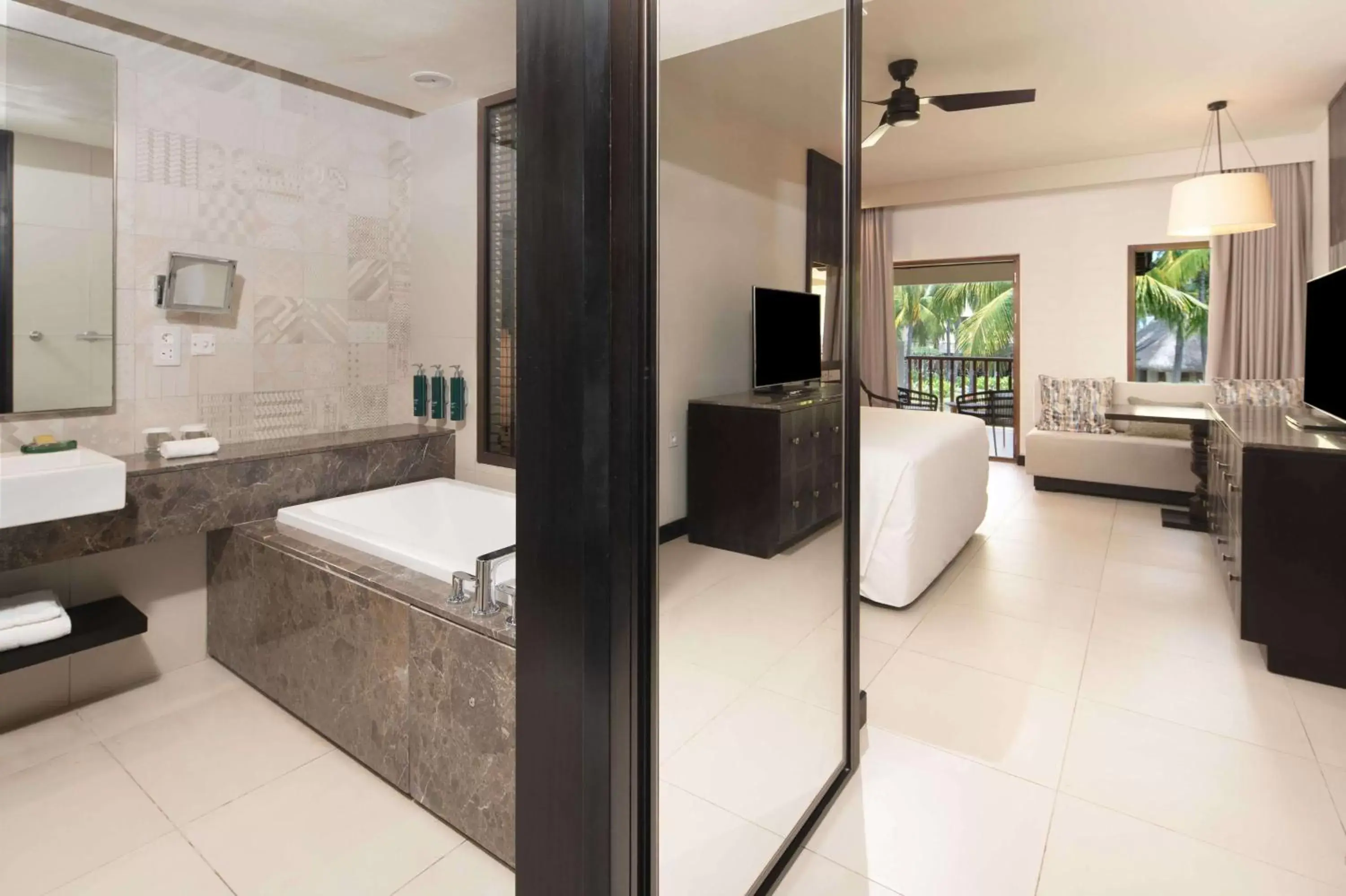 Bedroom, Bathroom in Hilton Mauritius Resort & Spa