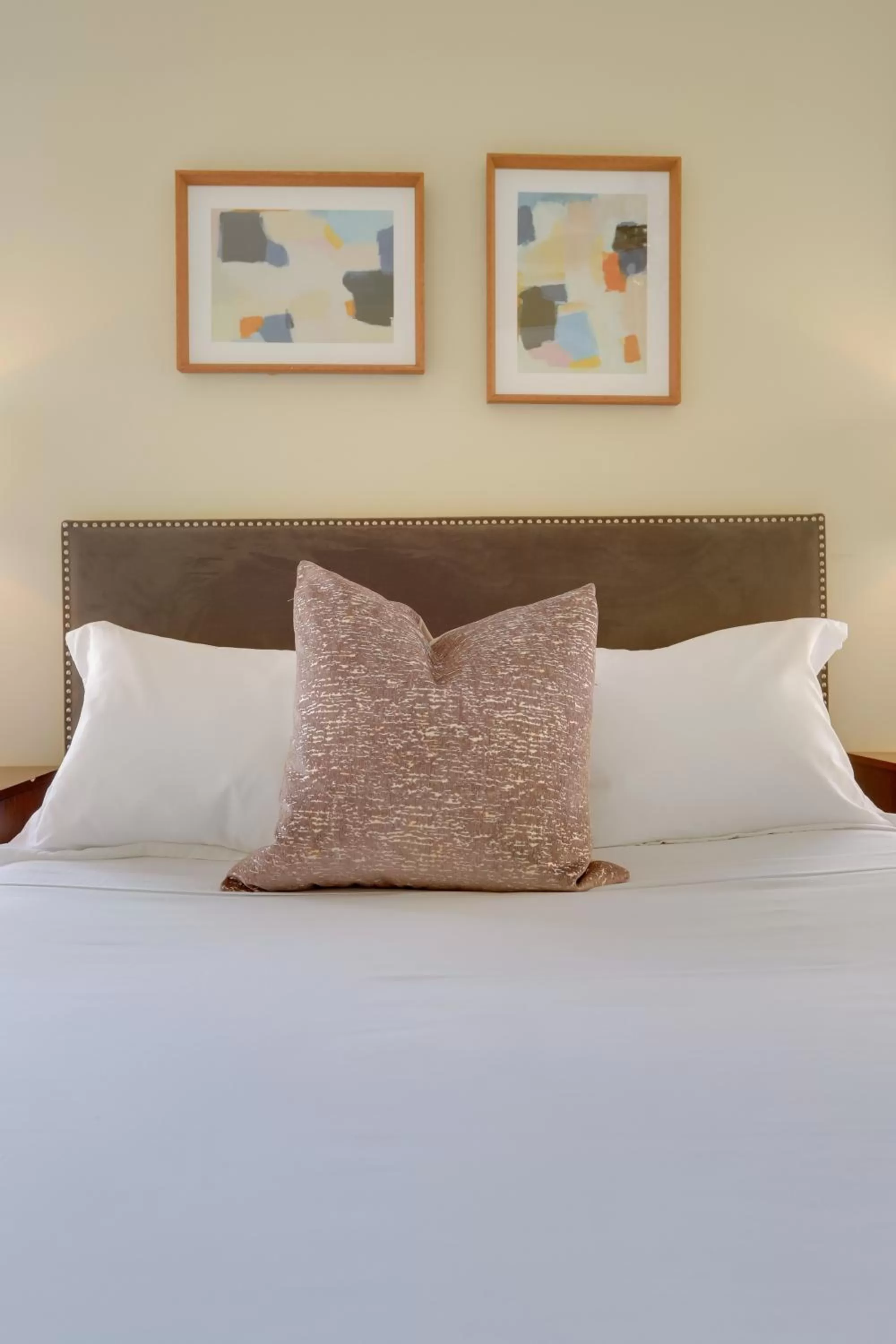 Bed in Sojourn at DuPont Place