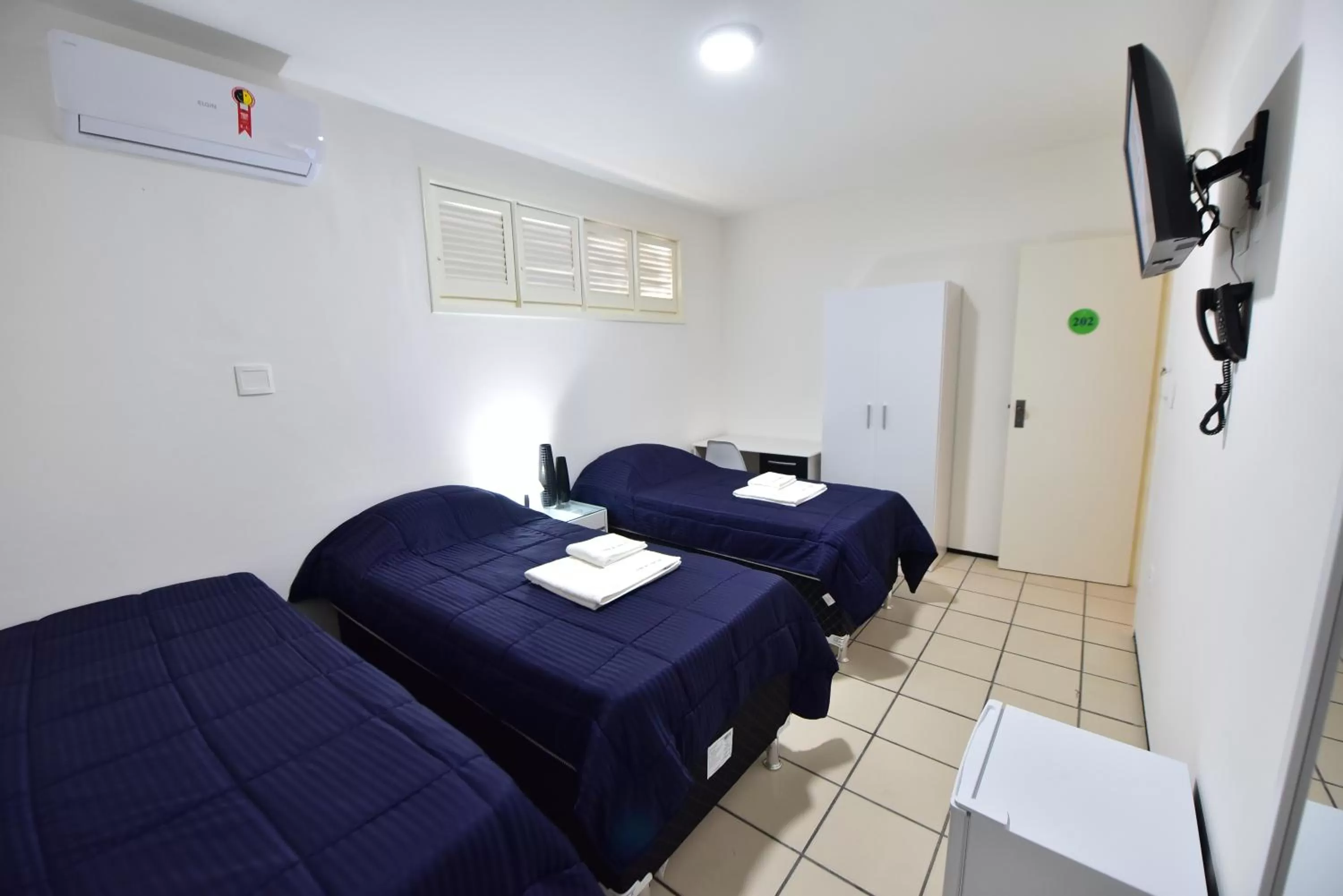 Bed in LIVE IN FORTALEZA HOTEL