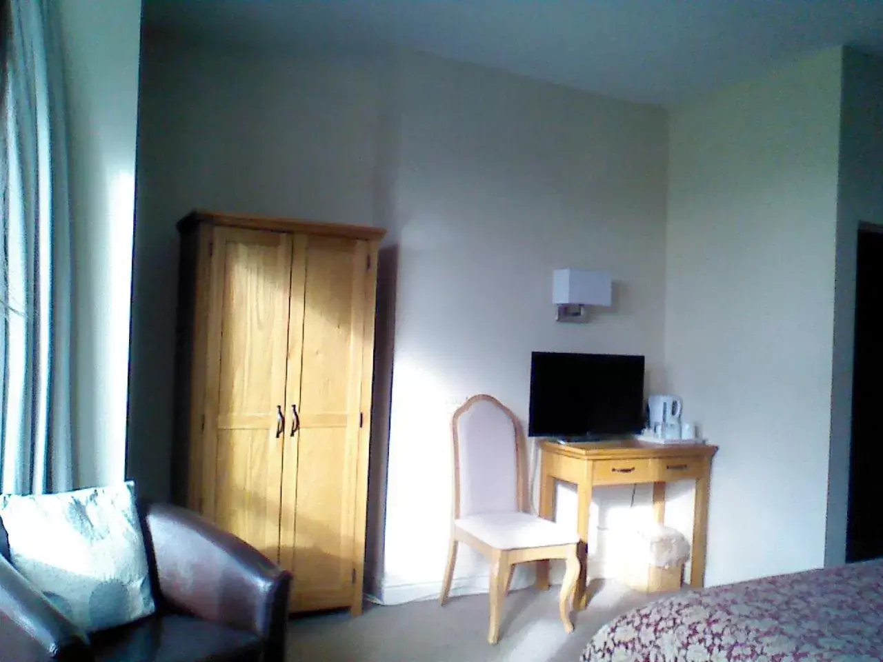 Photo of the whole room, TV/Entertainment Center in Mountbatten Hotel