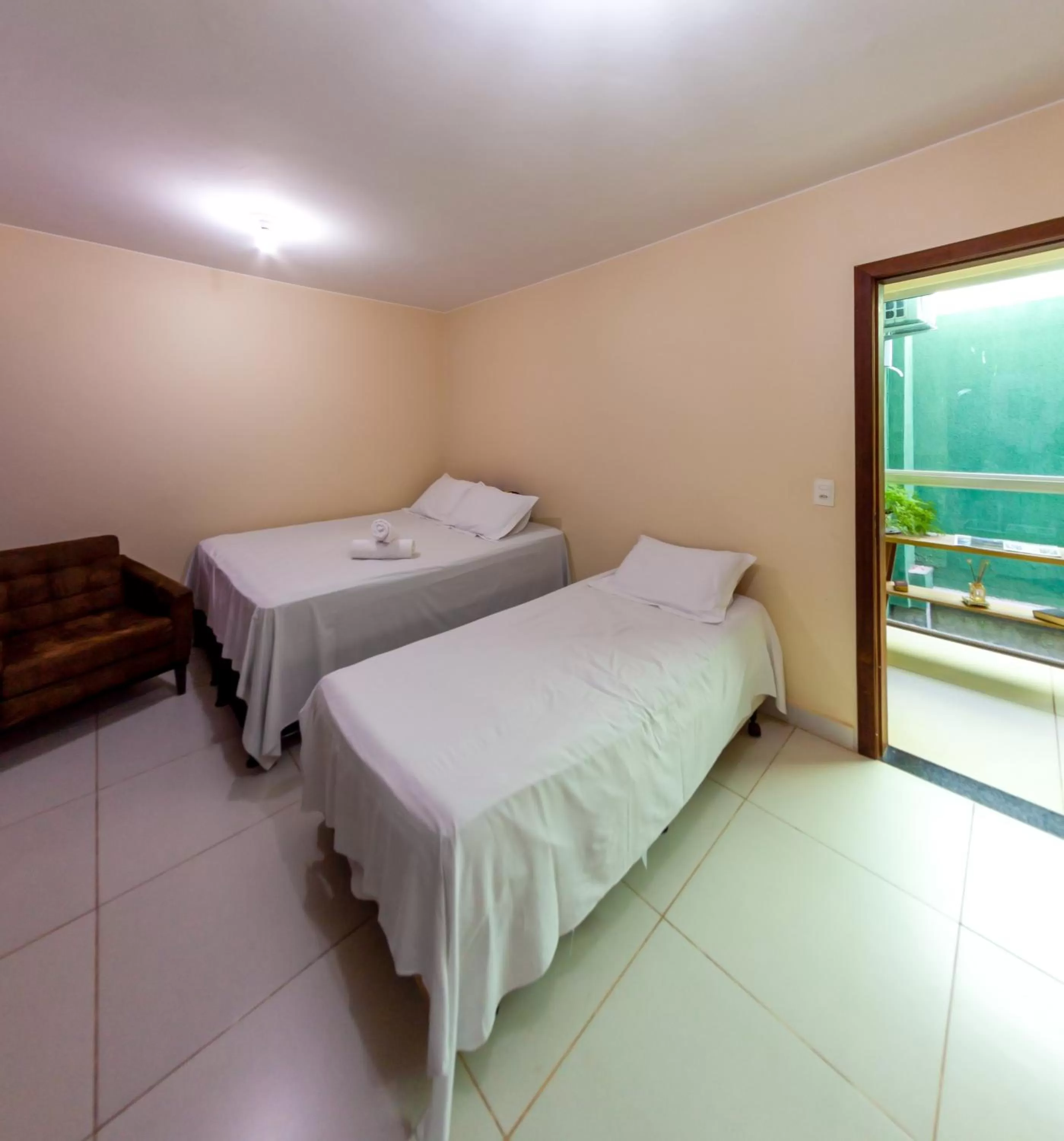 Photo of the whole room, Bed in Pousada Jardim Brasília