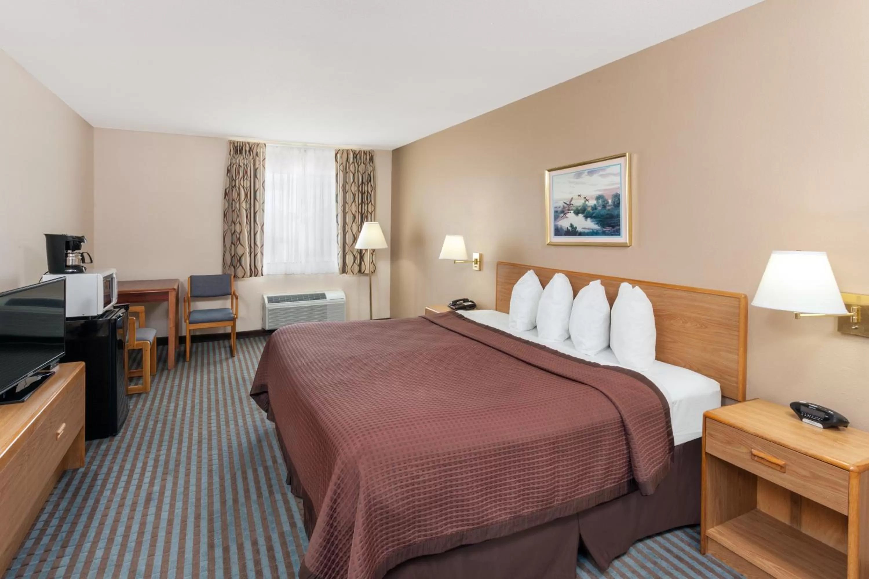 Bed in Days Inn by Wyndham Charleston