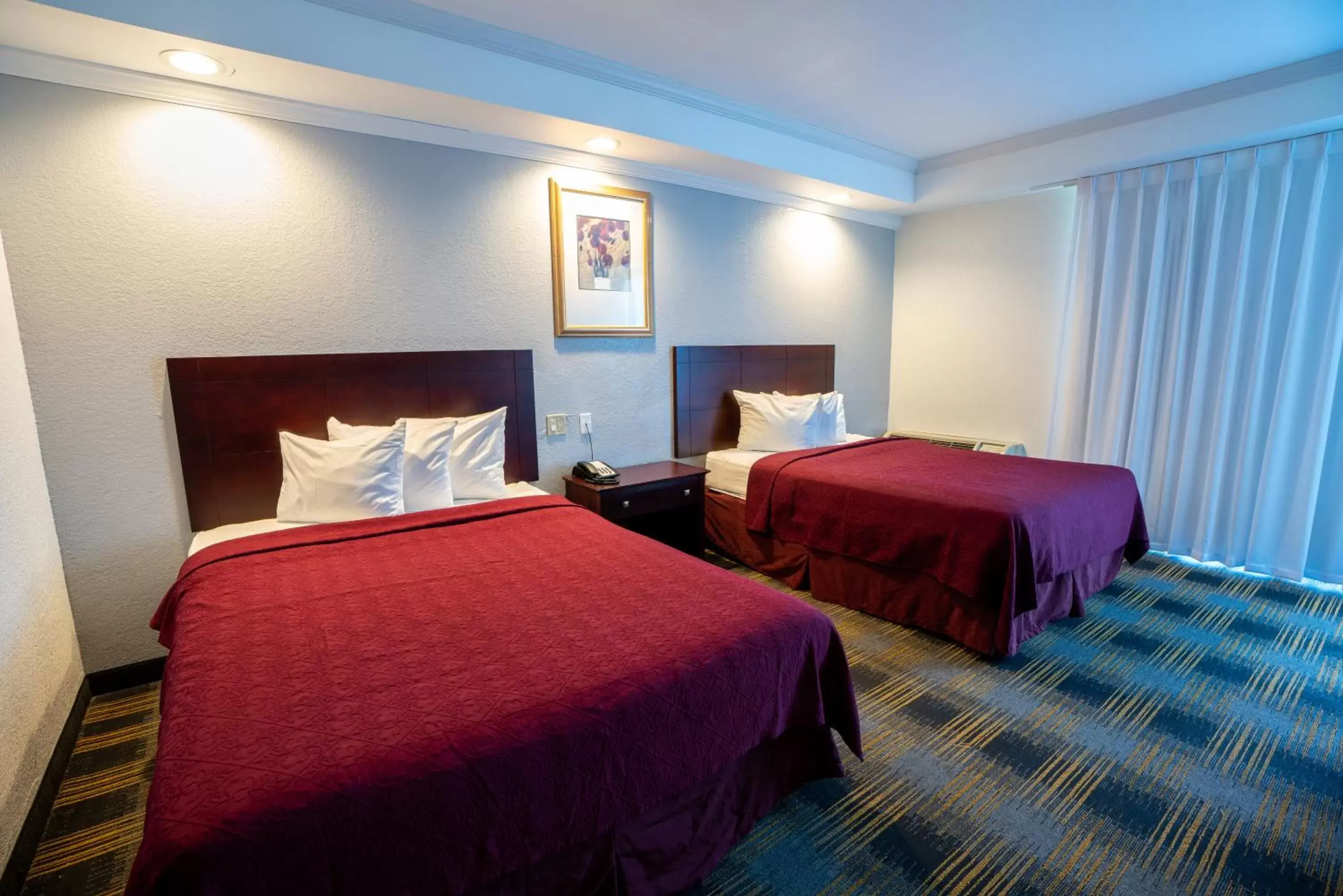 Bed in Riverview Inn & Suites Bed in Riverview Inn & Suites