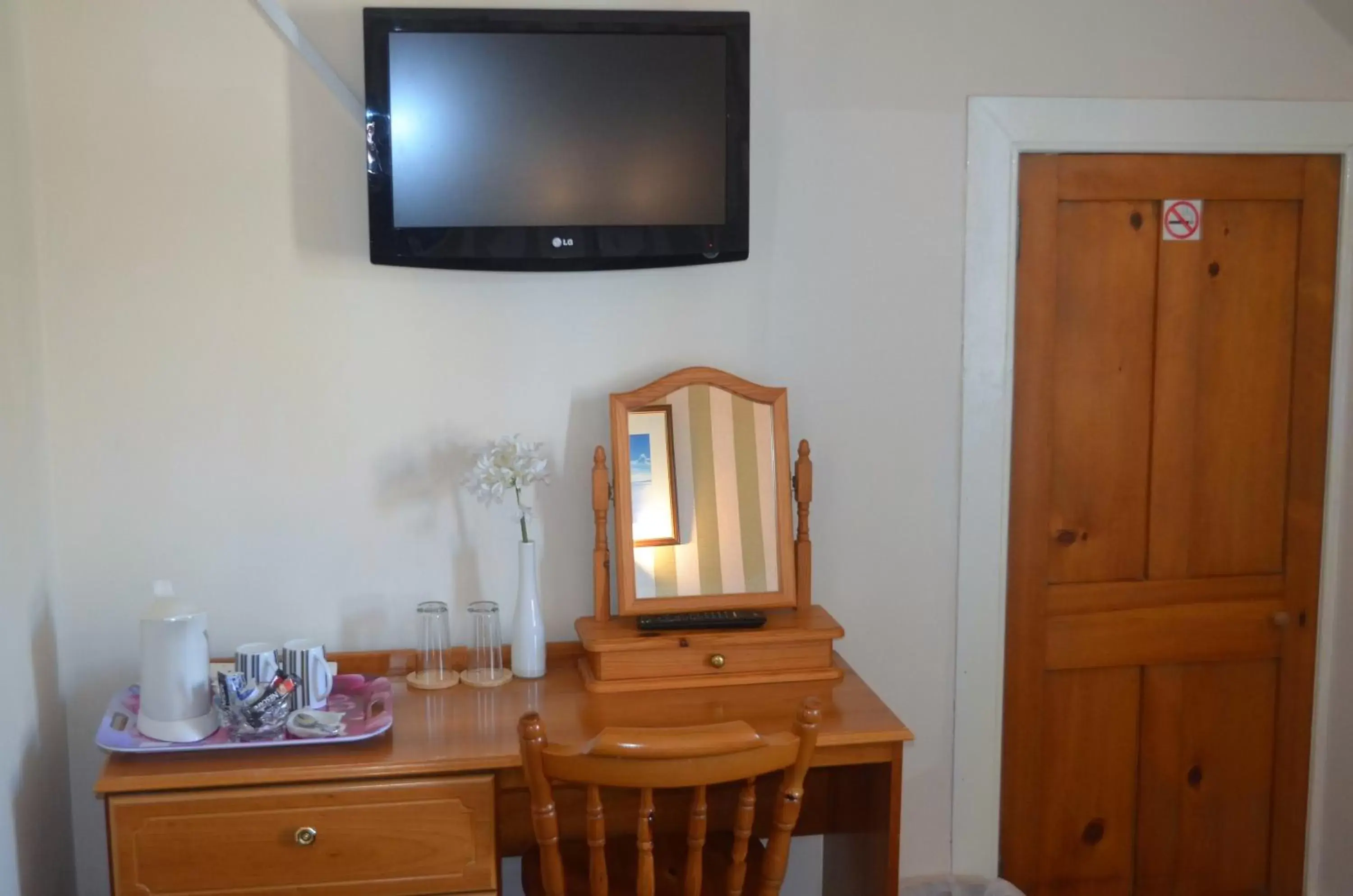 Photo of the whole room, TV/Entertainment Center in The Quaich B&B