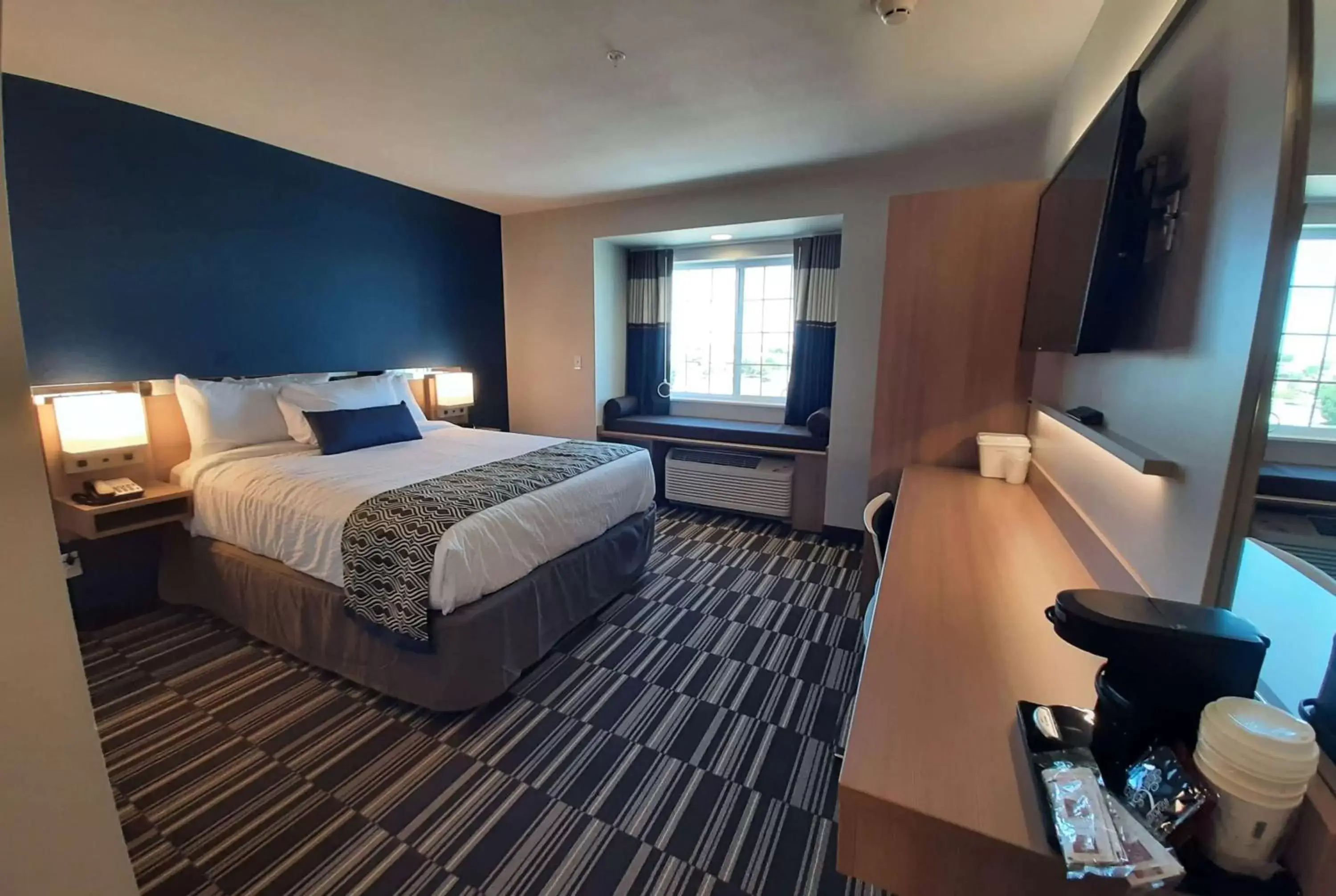 Bed in Microtel Inn & Suites by Wyndham Loveland