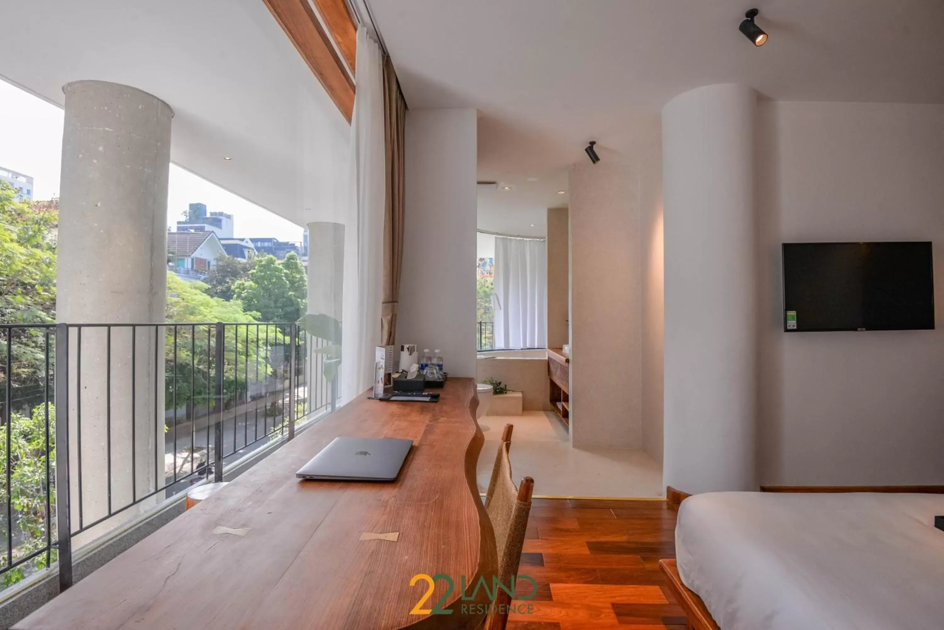 Communal lounge/ TV room, Bed in 22Land Hotel & Residence Communal lounge/ TV room, Bed in 22Land Hotel & Residence