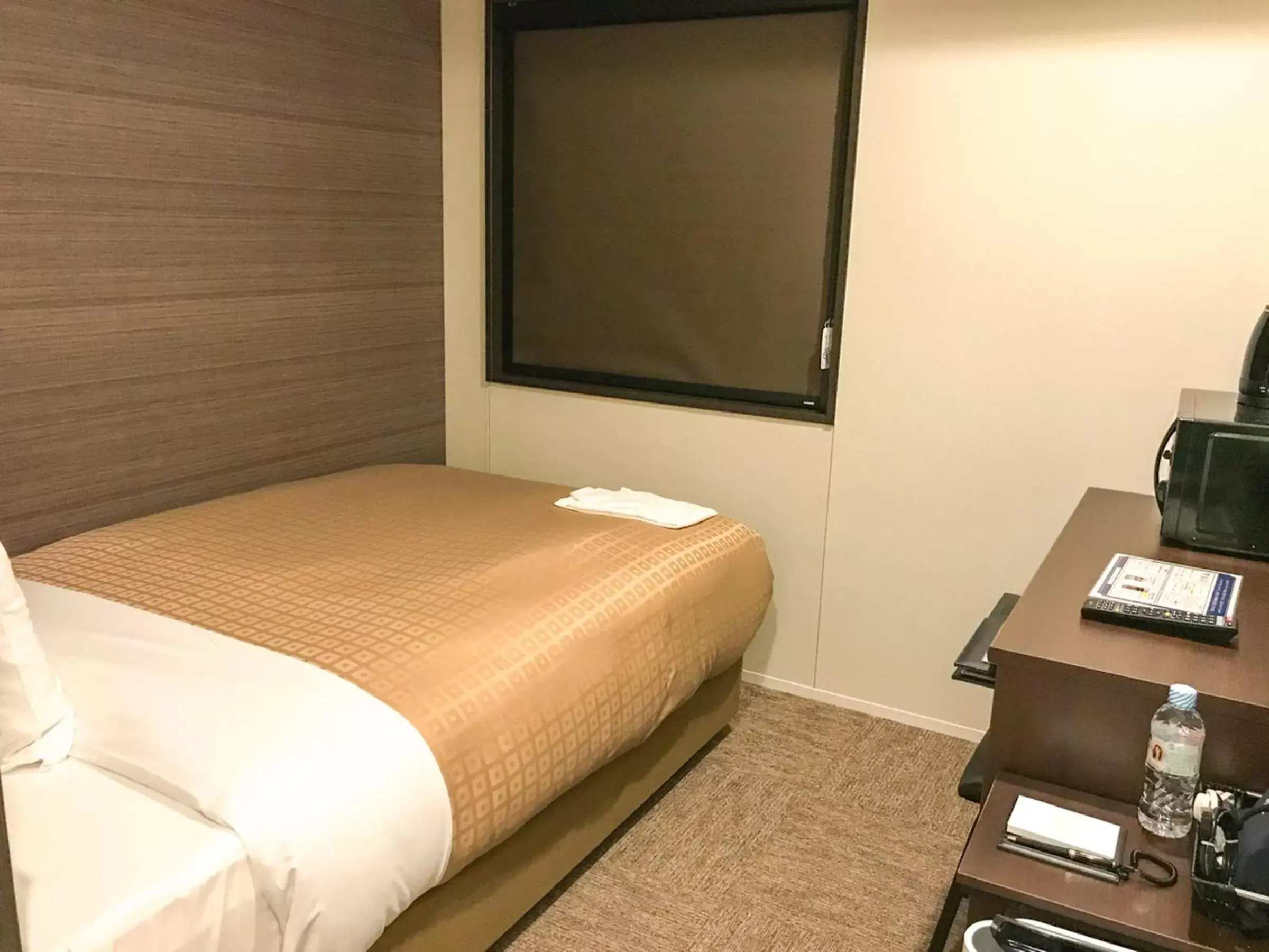 Bed in Hotel Livemax Toyama