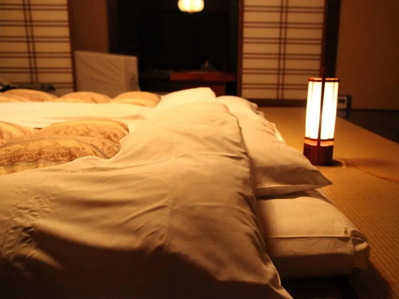 Bed in Wanosato Ryokan
