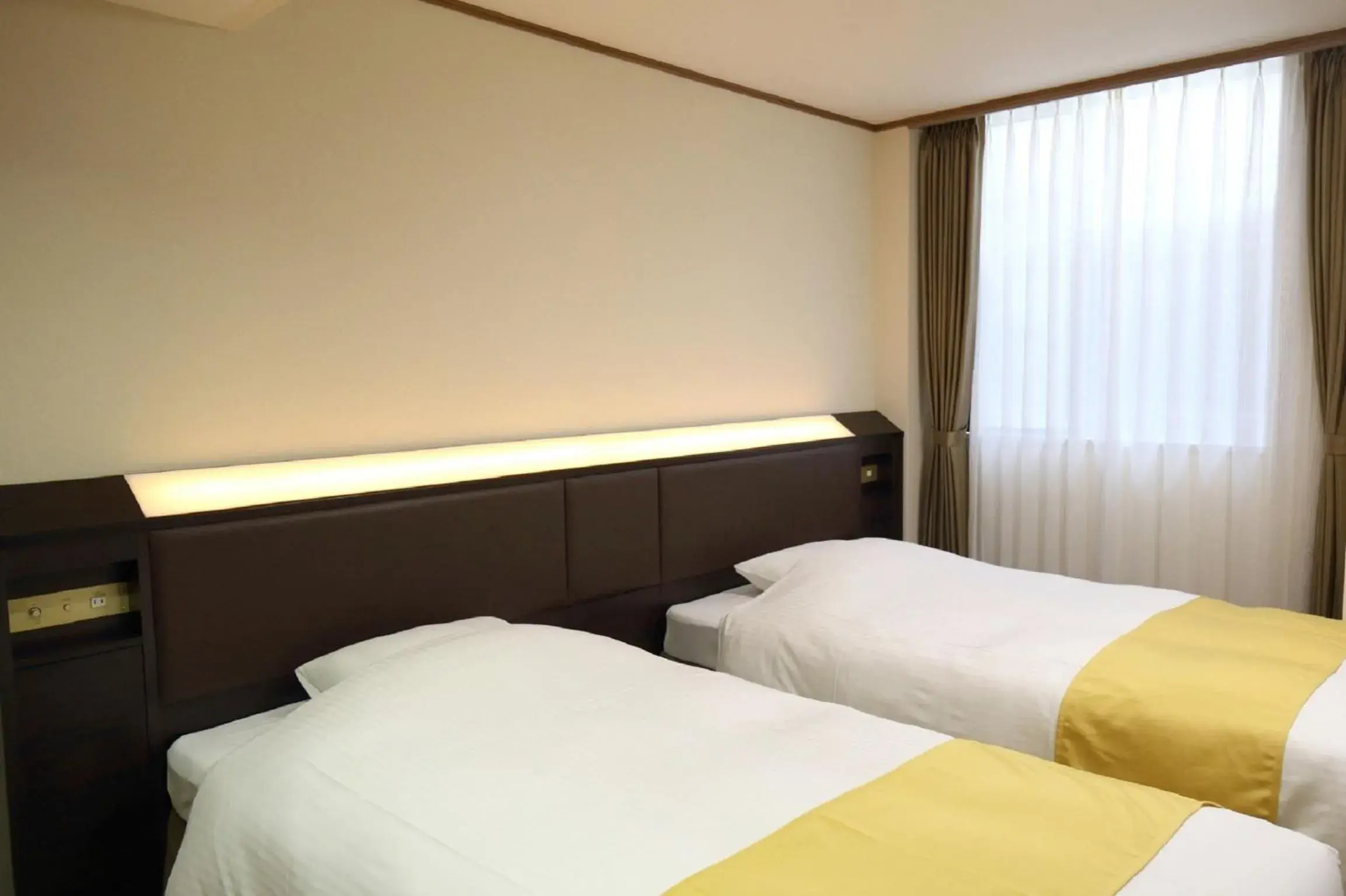Photo of the whole room, Bed in Hotel Awina Osaka