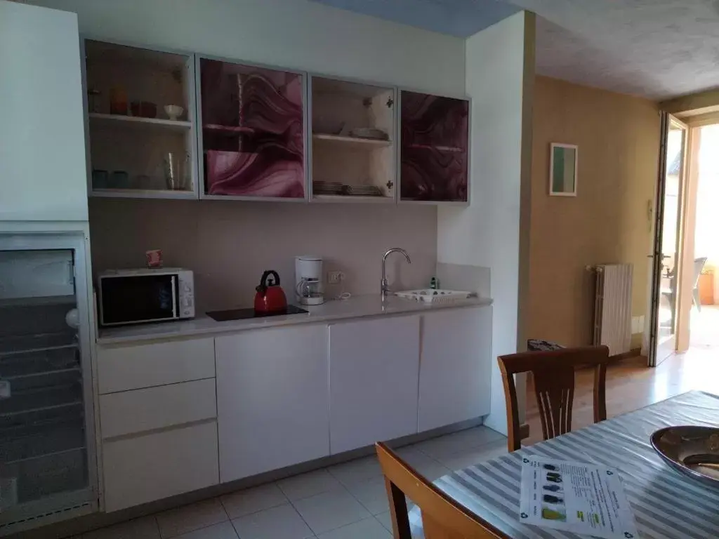 Kitchen/Kitchenette in Borgo al Sole by Garda Facilities