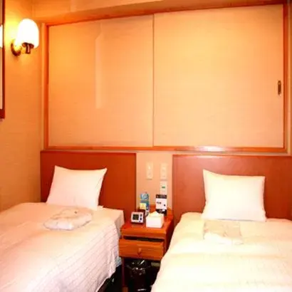 Bed in Smile Hotel Hachinohe