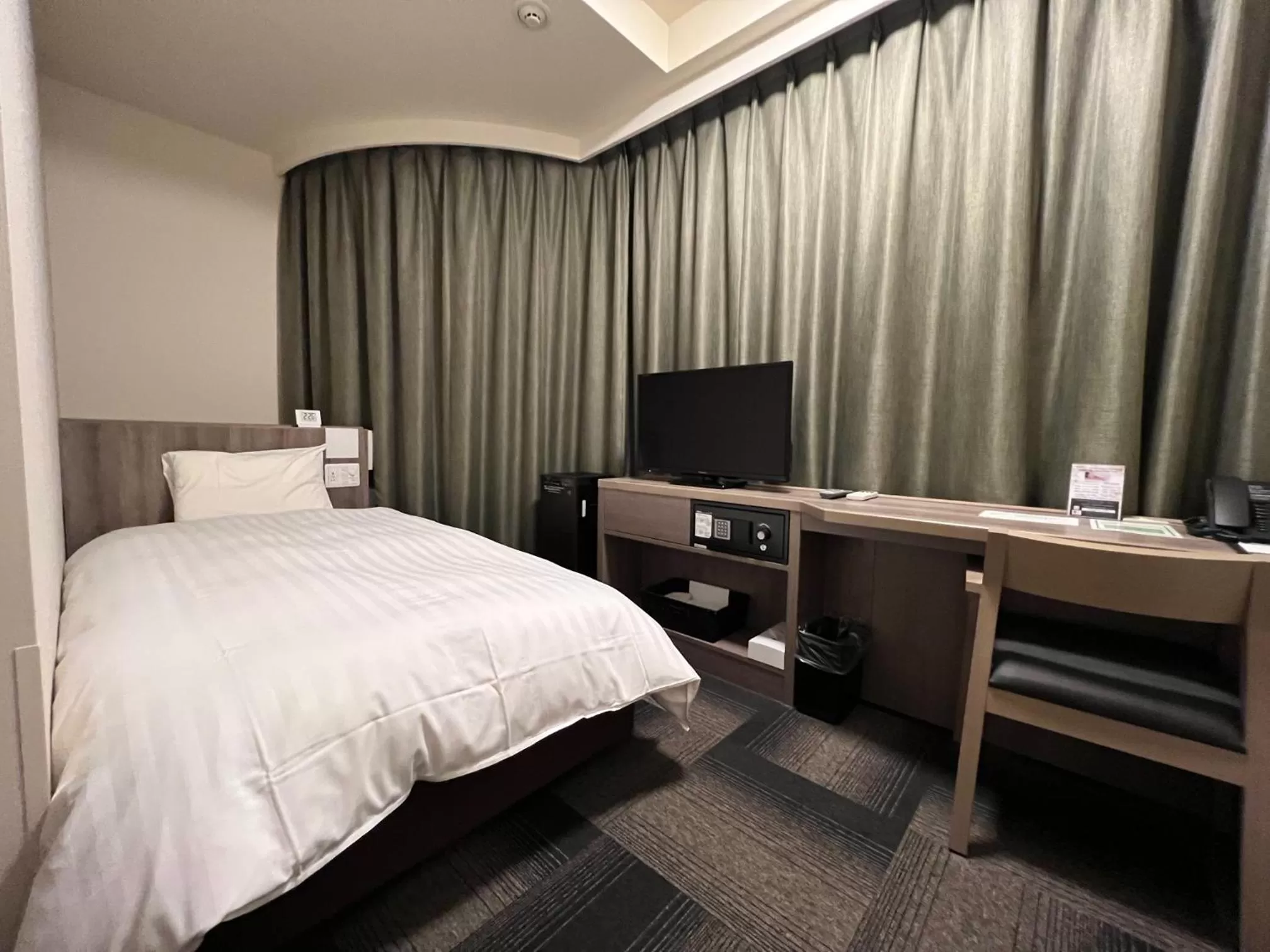 Bed in Dormy Inn Korakuen