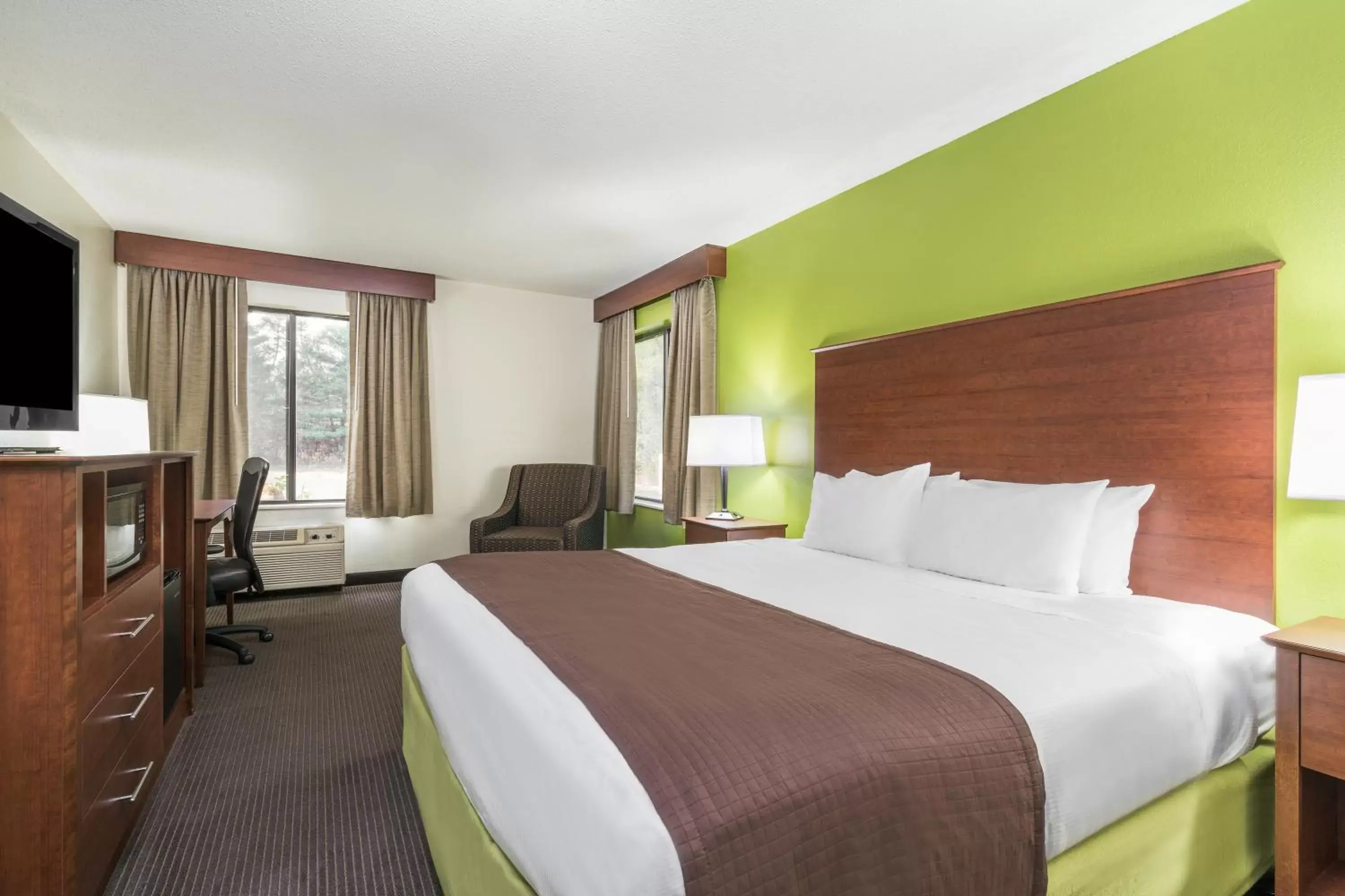 Photo of the whole room, Bed in AmericInn by Wyndham Black River Falls I-94 on ATV Trail