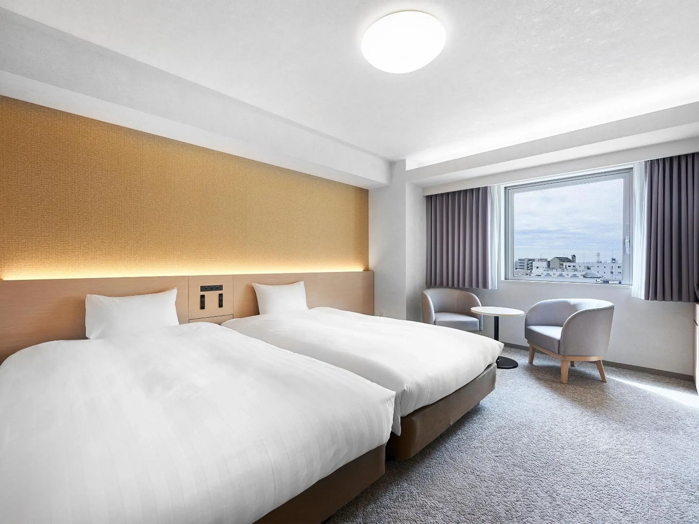 Bed in Daiwa Roynet Hotel Kawasaki