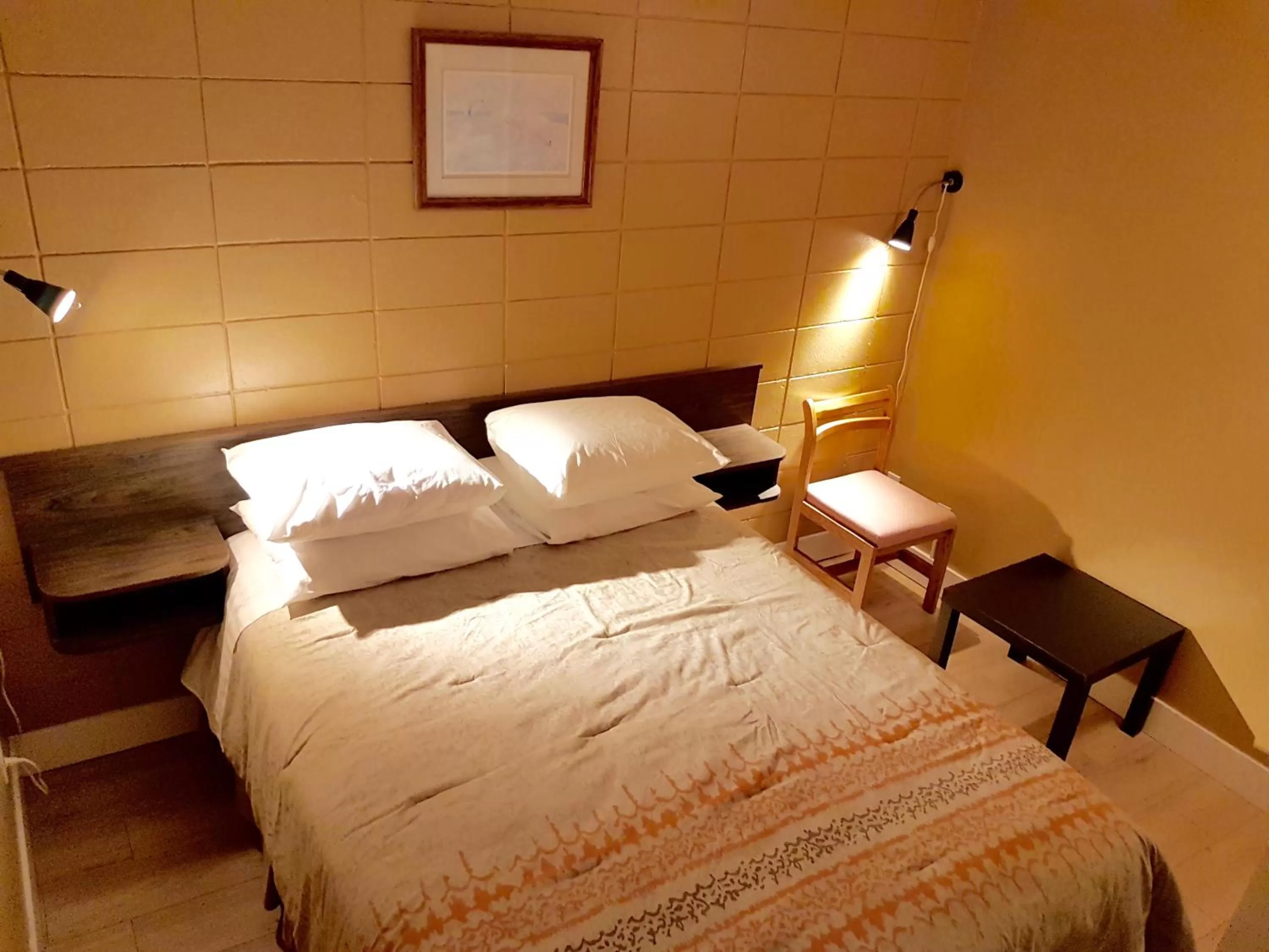 Bed in Above Tide Motel