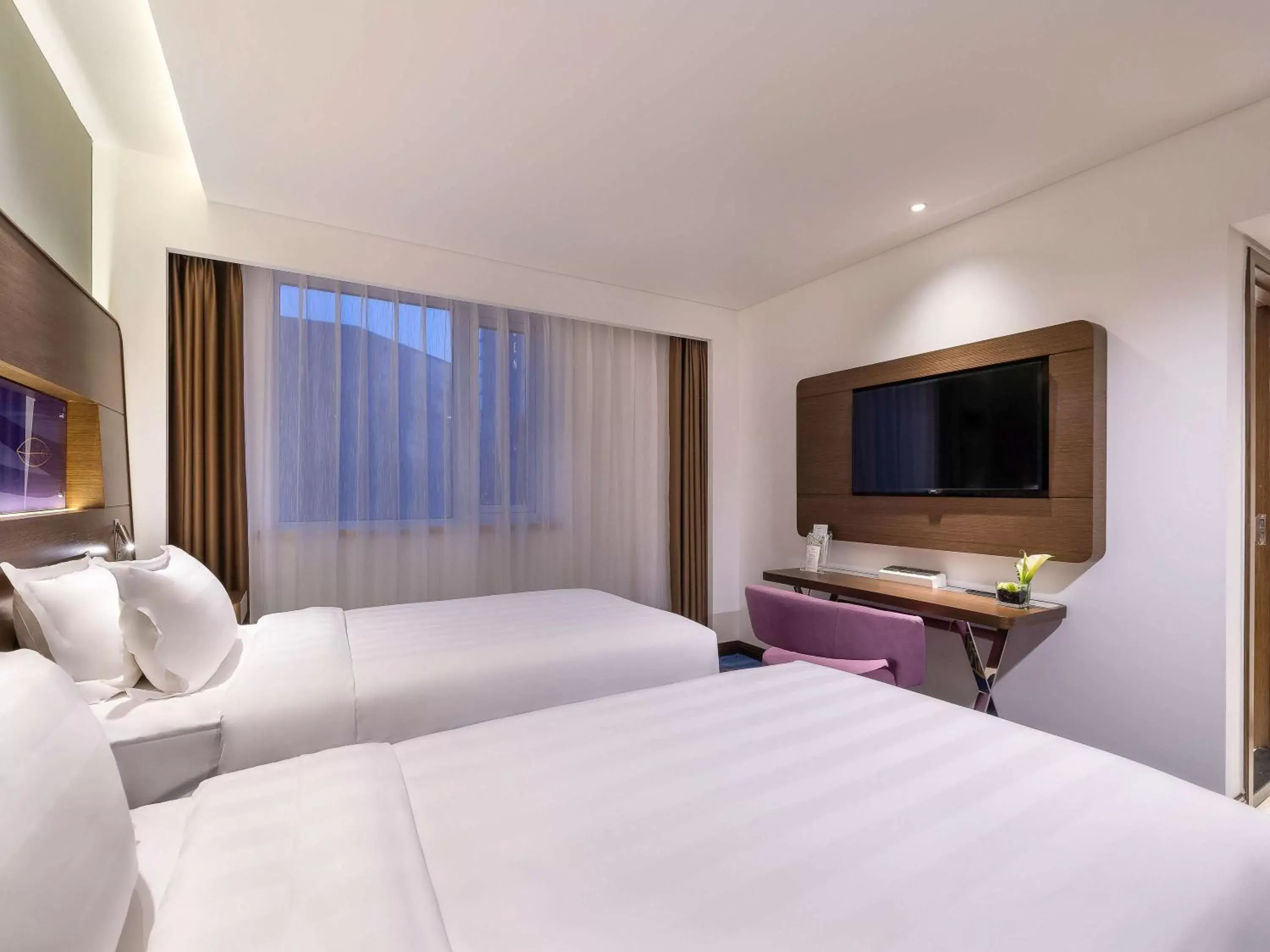 Photo of the whole room, Bed in Novotel Beijing Peace