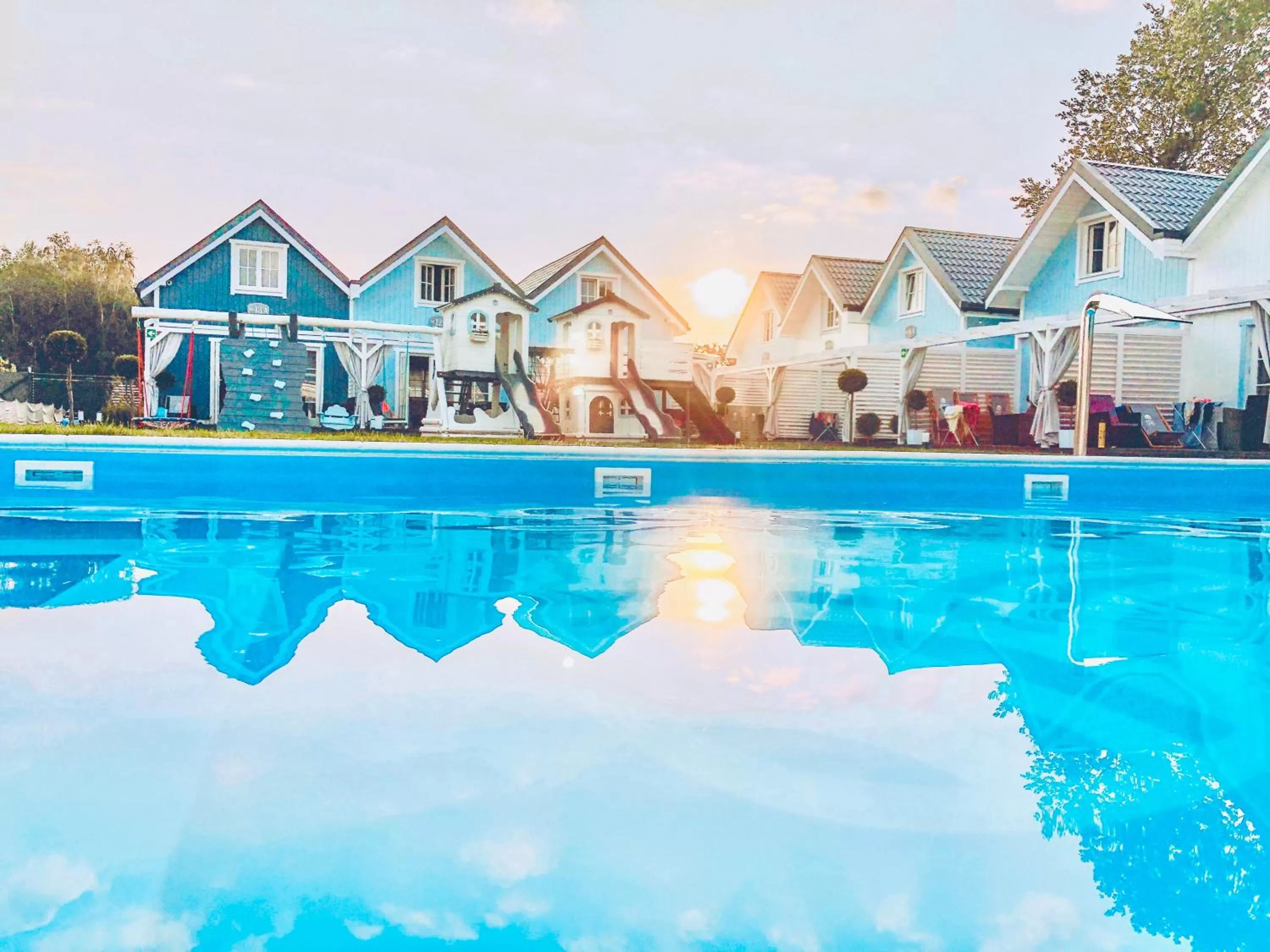 Children play ground, Swimming Pool in Baltic Family - domki całoroczne nad morzem basen kidsclub rowery