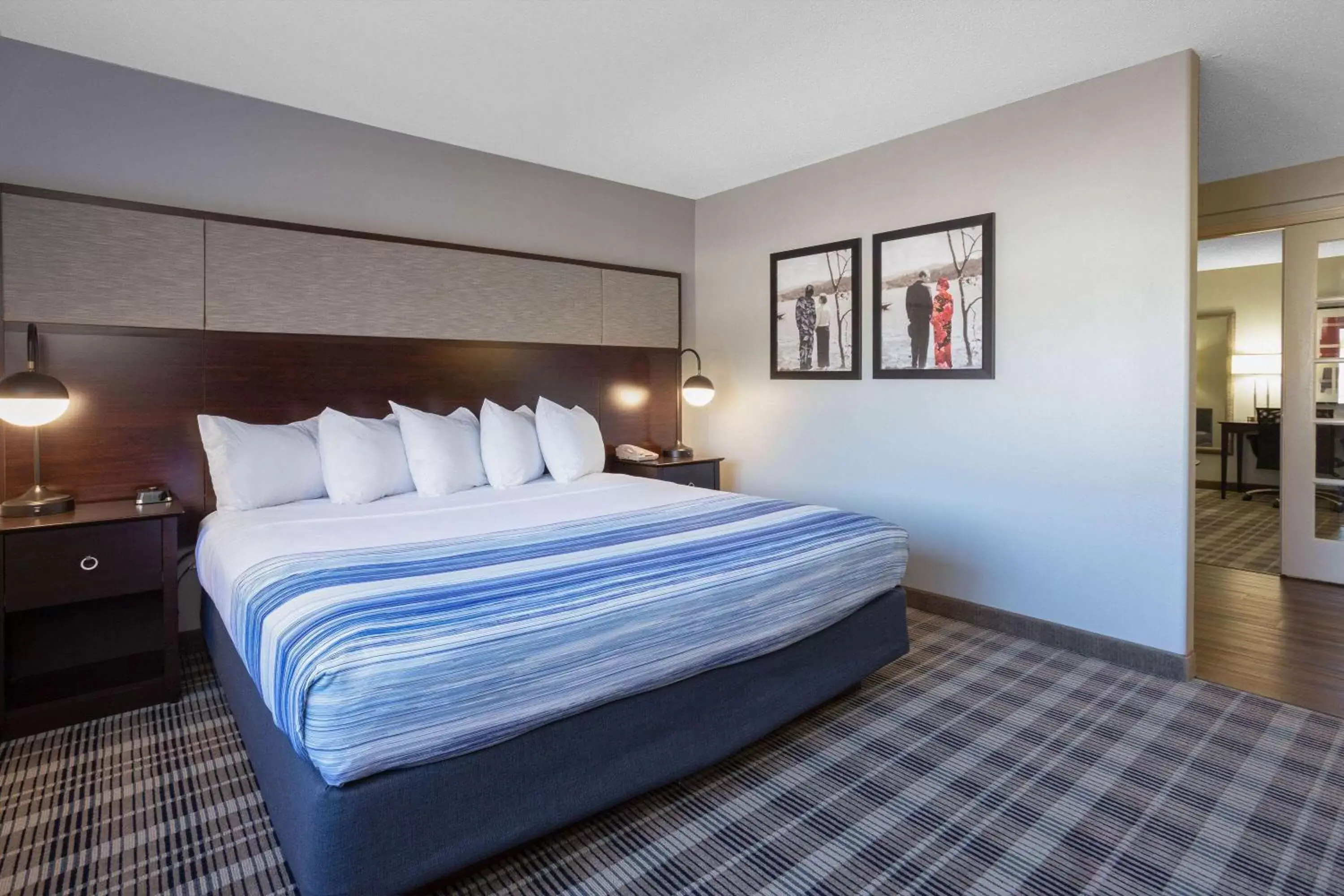 Bed in AmericInn by Wyndham Madison South Bed in AmericInn by Wyndham Madison South