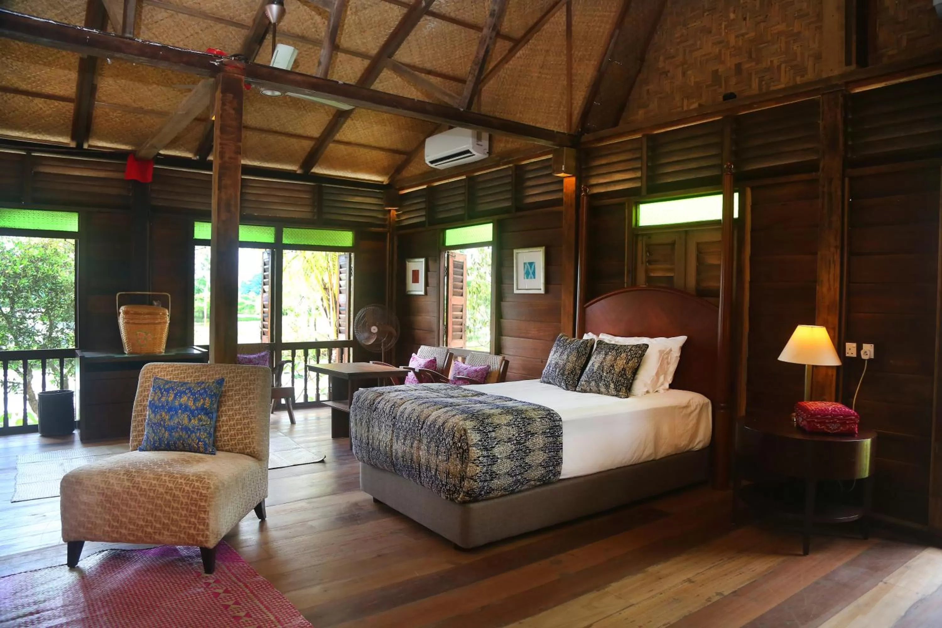 Bed in Kunang Kunang Heritage Villas