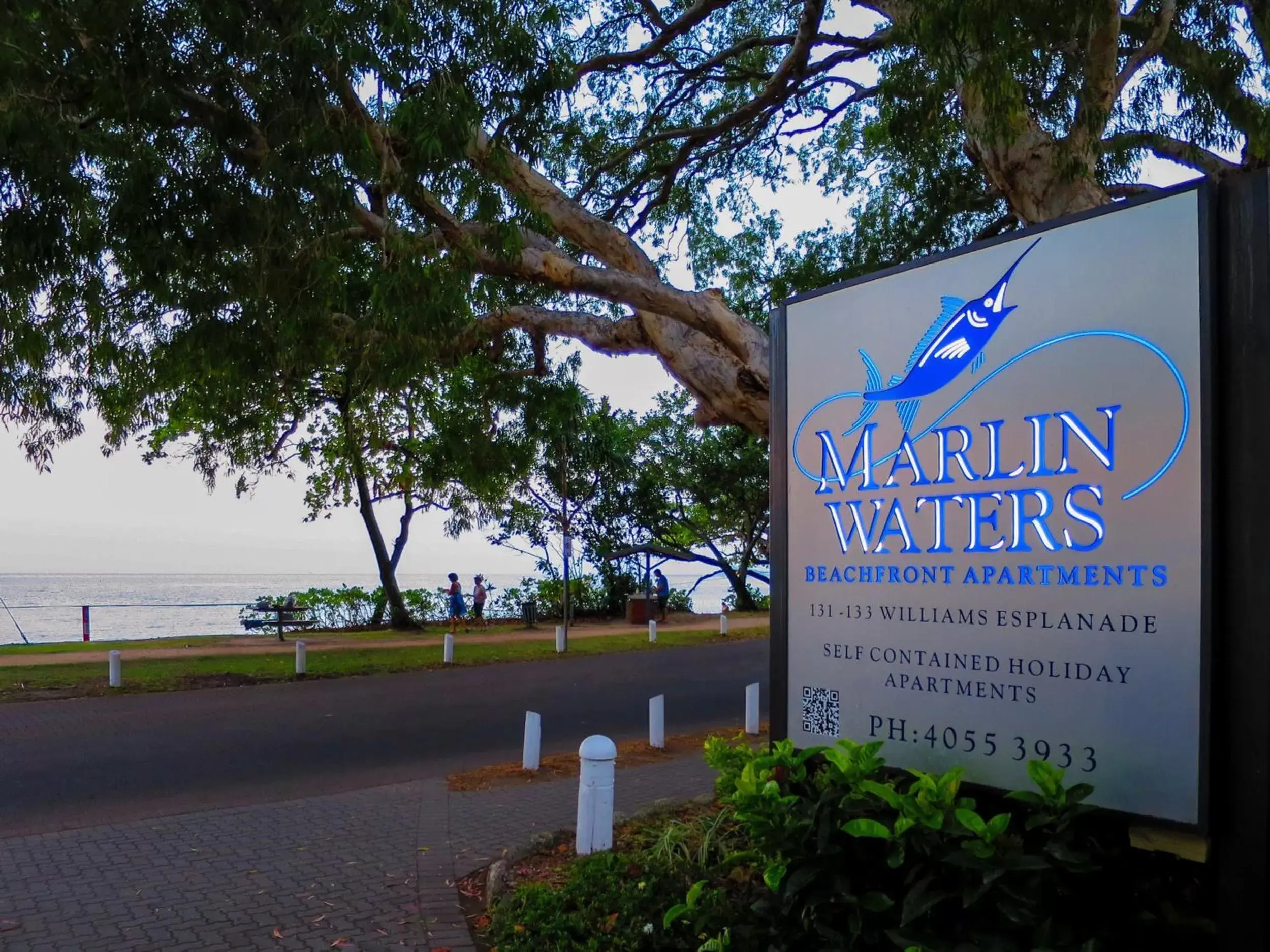 Property logo or sign in Marlin Waters Beachfront Apartments