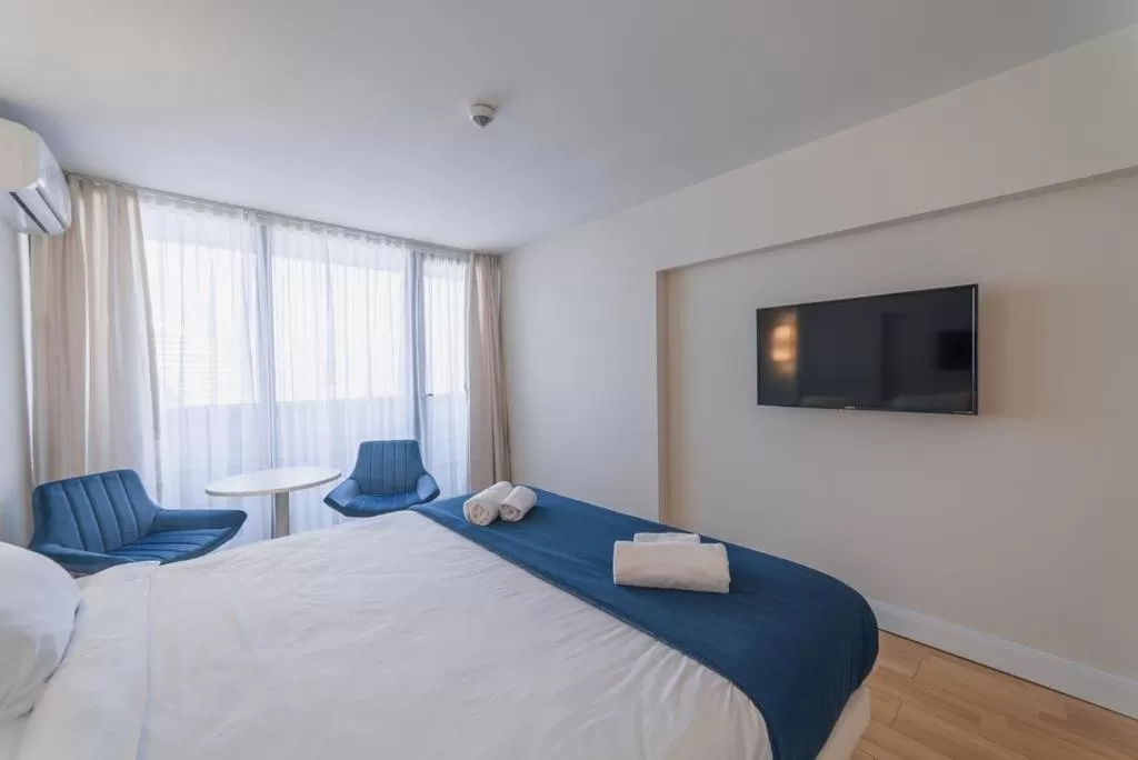 Bed in Orbi City Batumi Beach