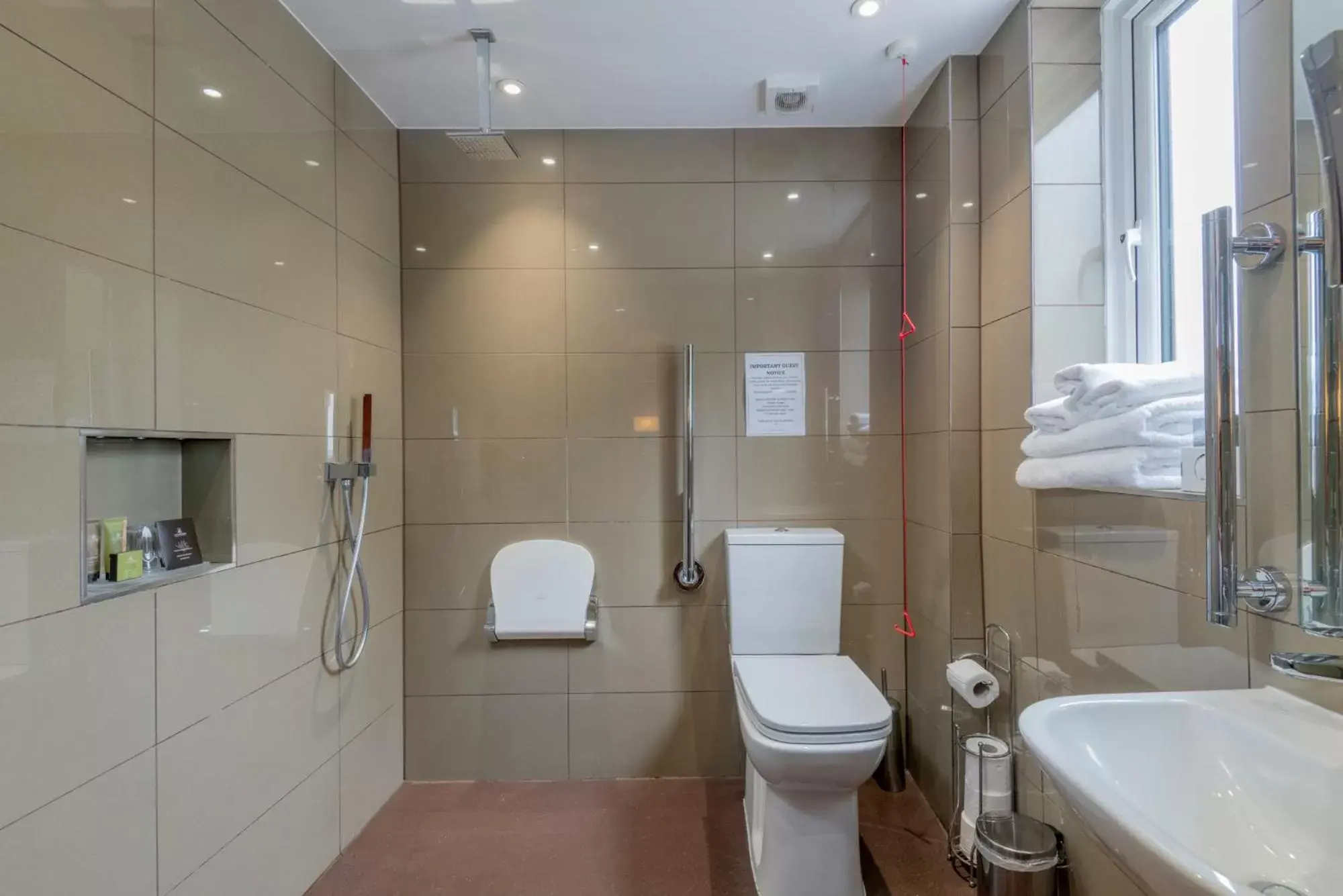 Bathroom in Donnington Manor Hotel