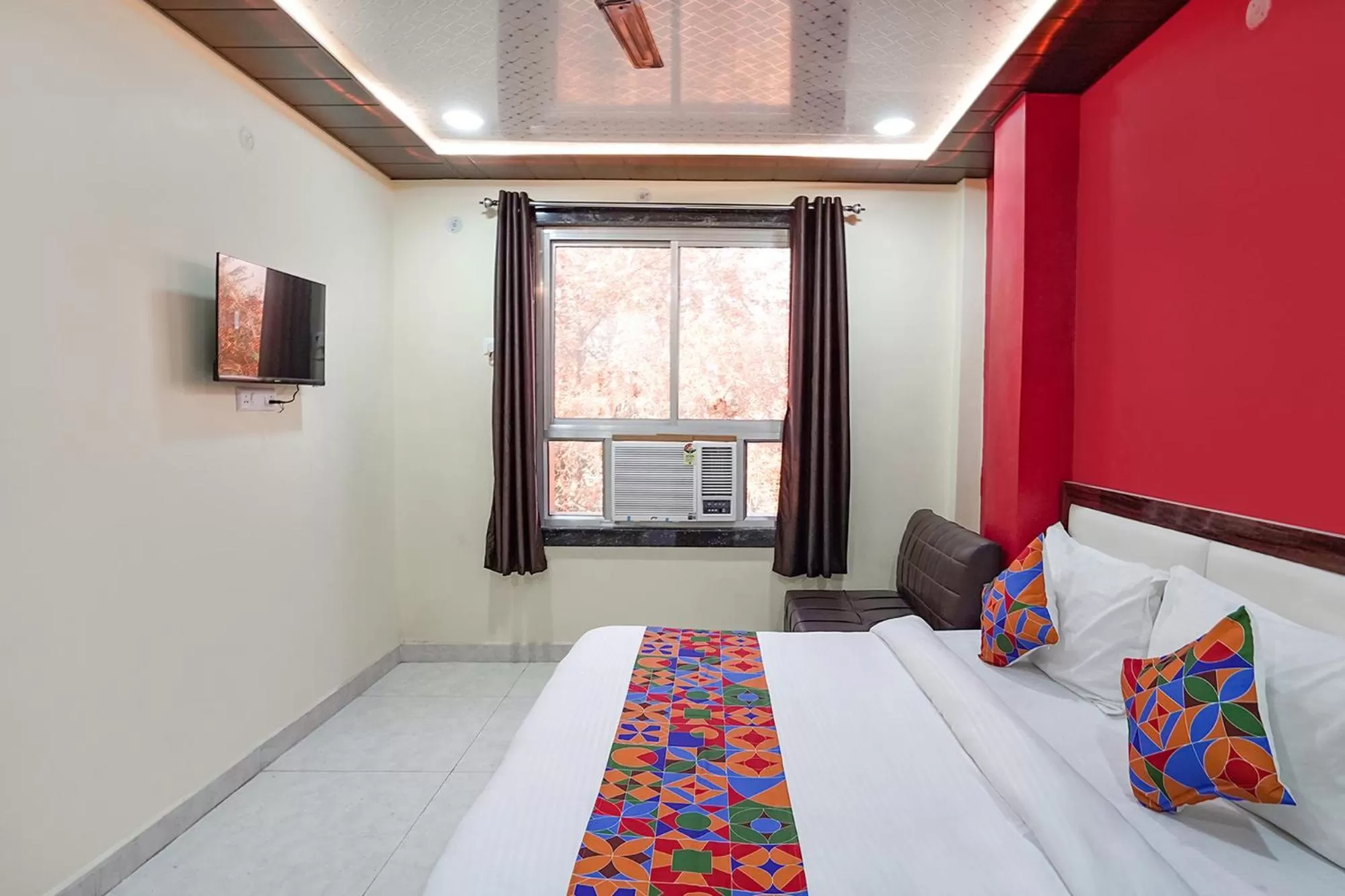Bed in FabHotel Rajdhani