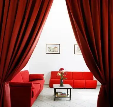 Communal lounge/ TV room, Seating Area in Hotel Trinidad