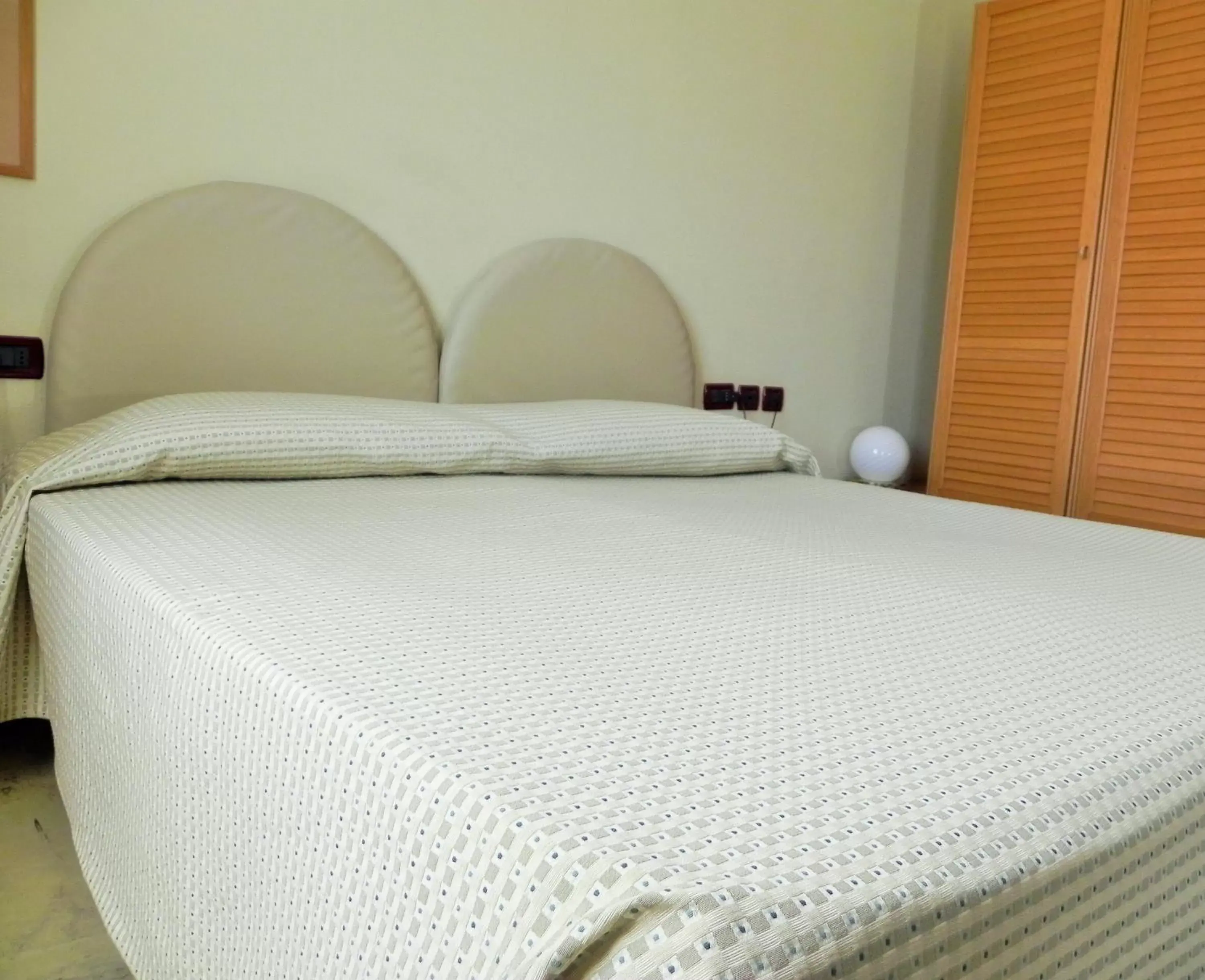 Bed in Torreata Hotel & Residence