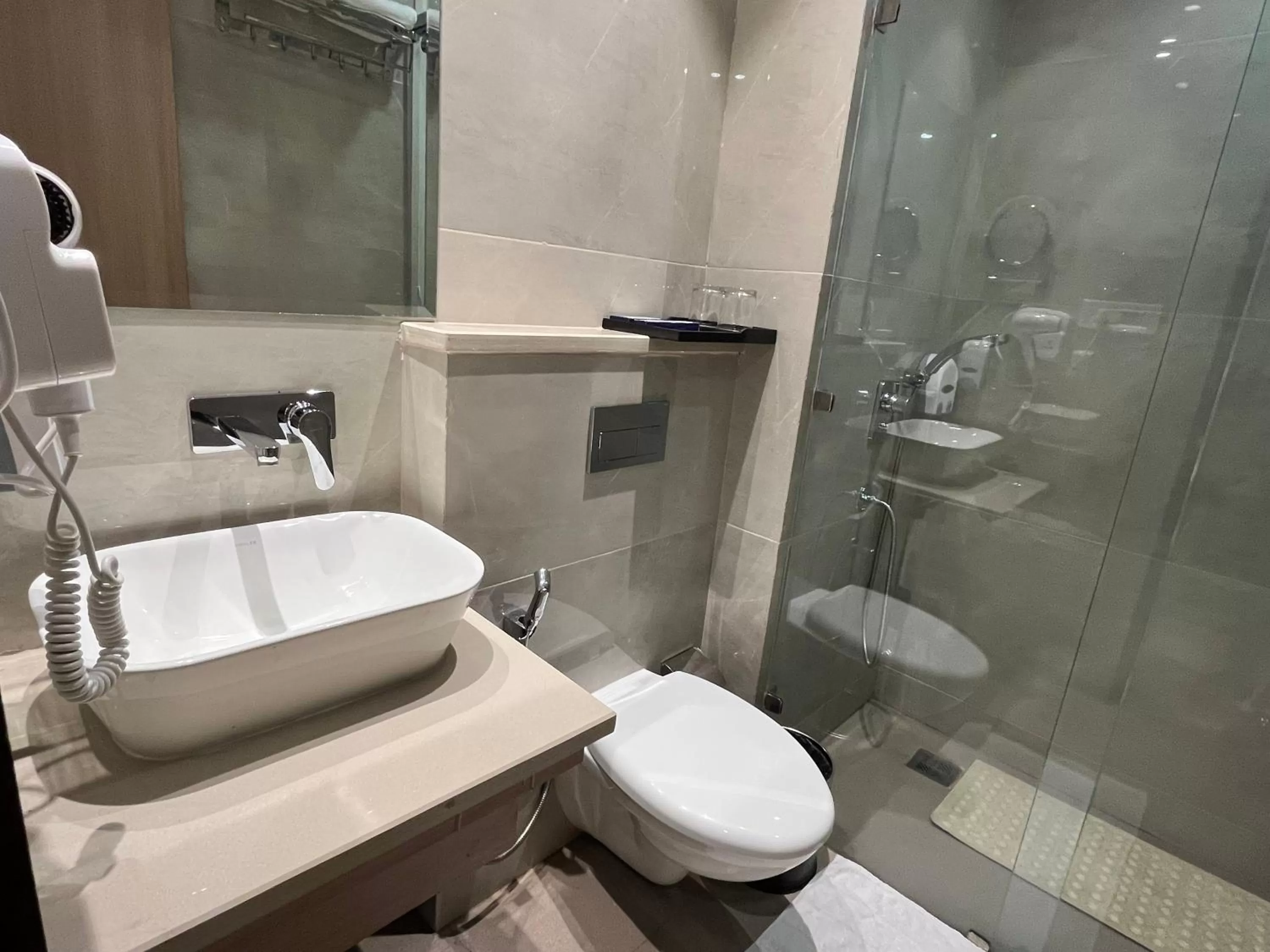 Bathroom in RRV Hotel